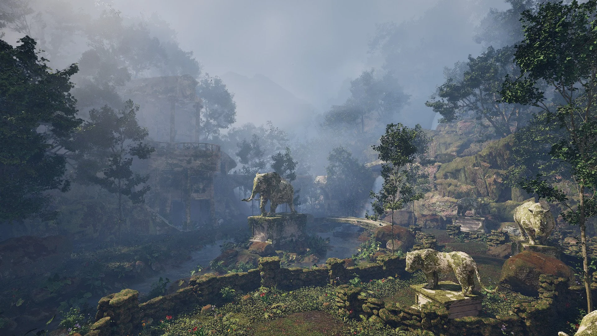 A misty forest scene with ancient elephant statues surrounded by lush trees, rocks, and greenery.