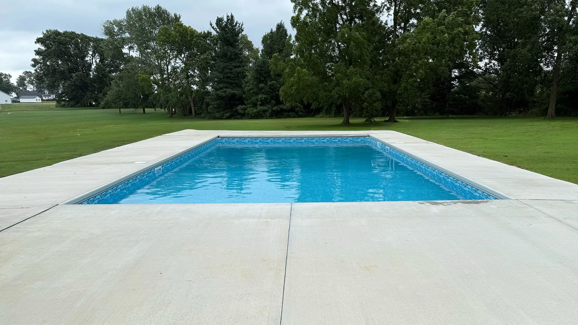 Finished inground pool installation in Brazil Indiana by Wallace Pools and Hardscapes