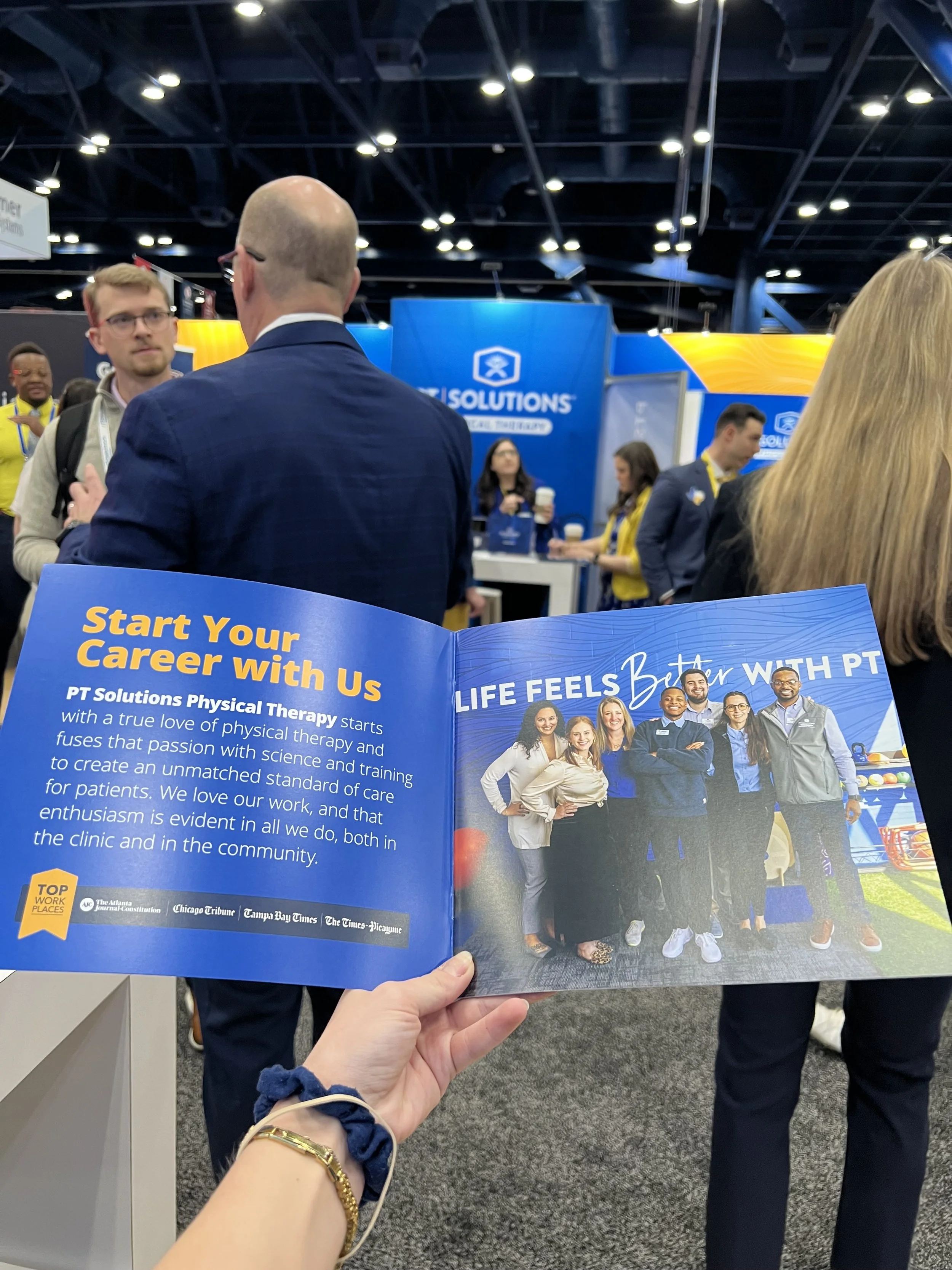 Printed materials extended the experience beyond the booth, reinforcing key messages after the initial interaction.