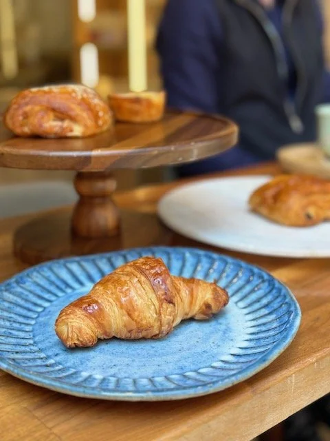 A flaky croissant, pain au chocolat, and ham and gruyere croissant