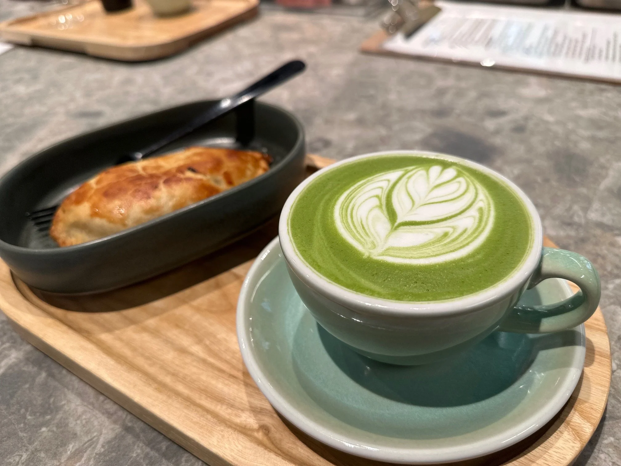 Matcha Latte with an empanada from Savory Crust