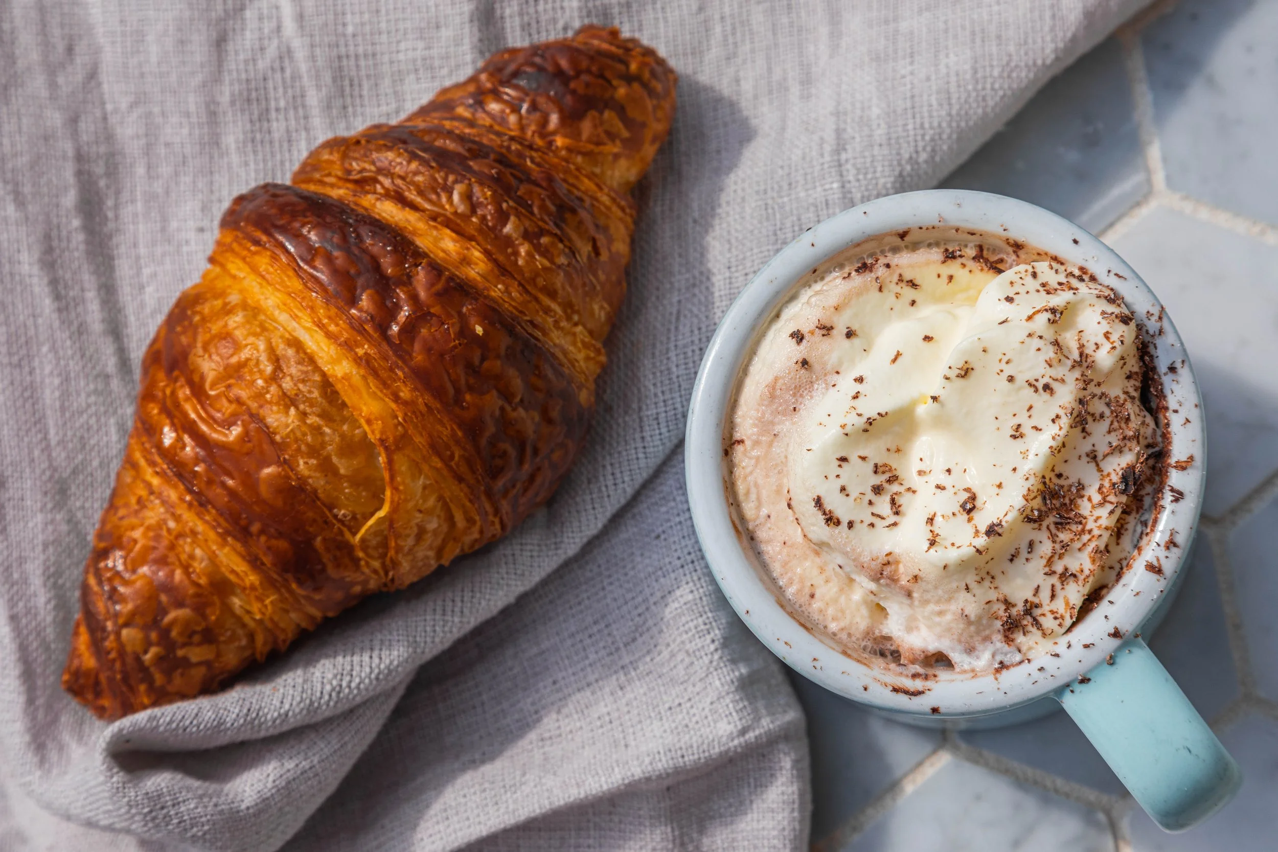 hot cocoa and croissant