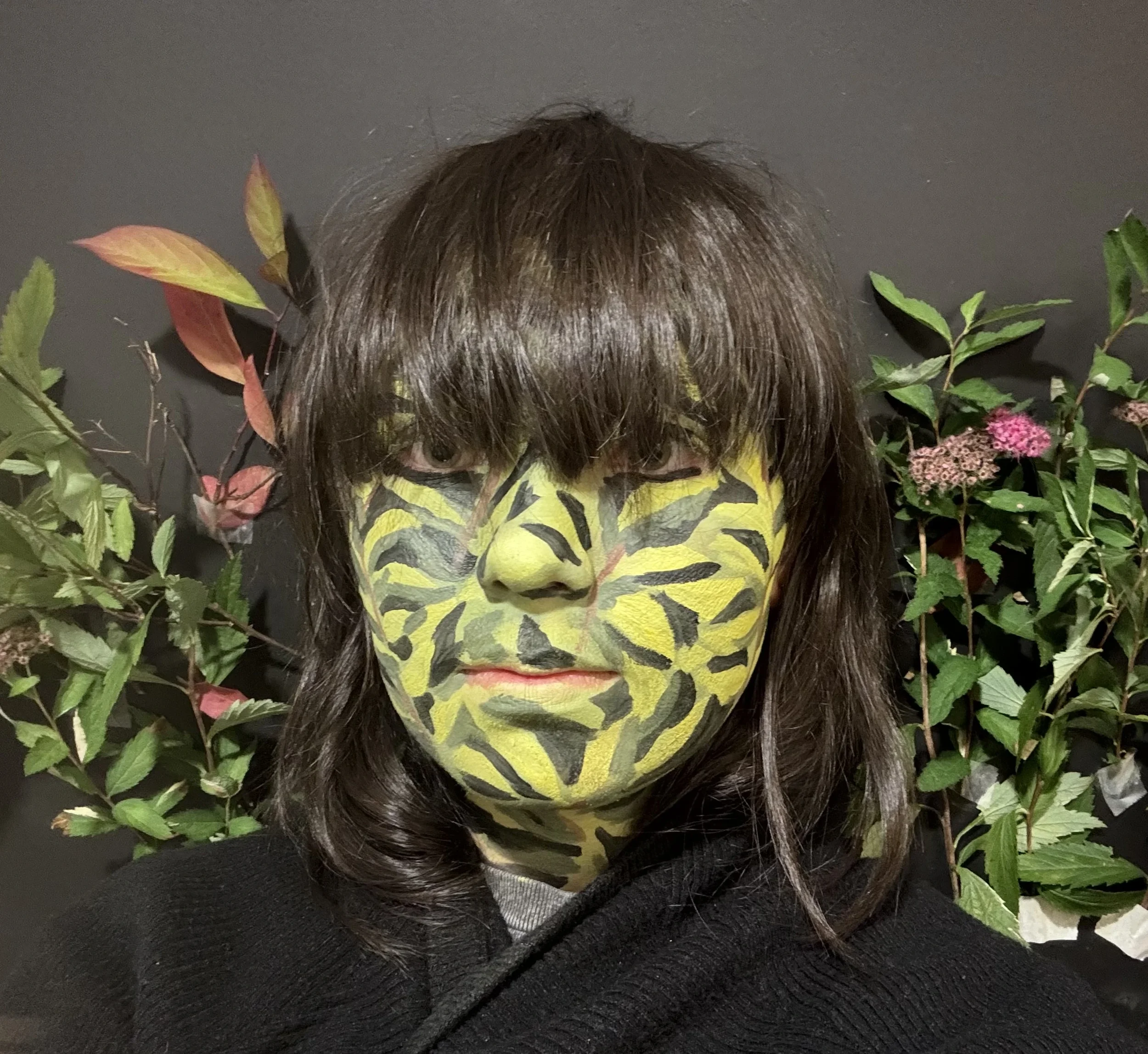 Woman with Green Facepaint and Flora Physical Art 2.webp