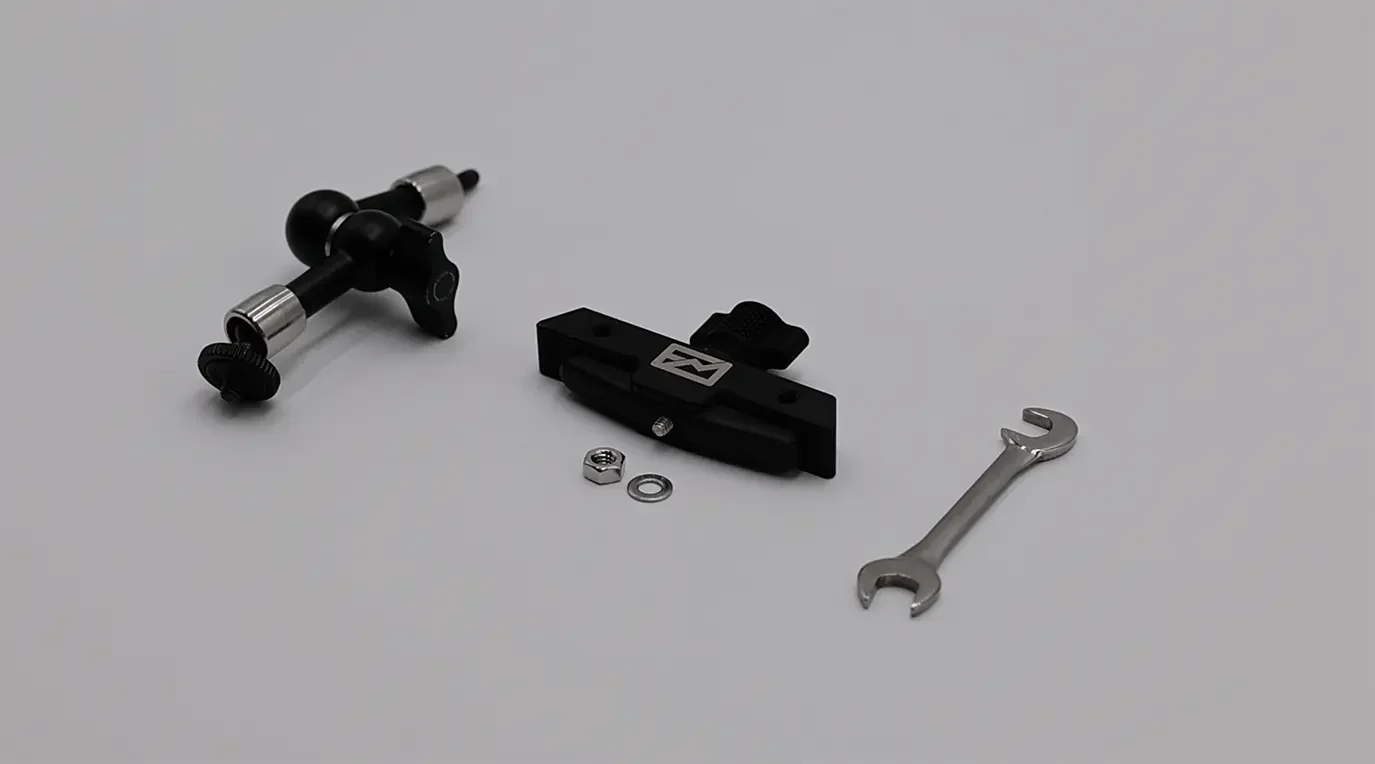 This image depicts the parts that the Fence Mod Chain Link Fence Camera Mount arrives in.