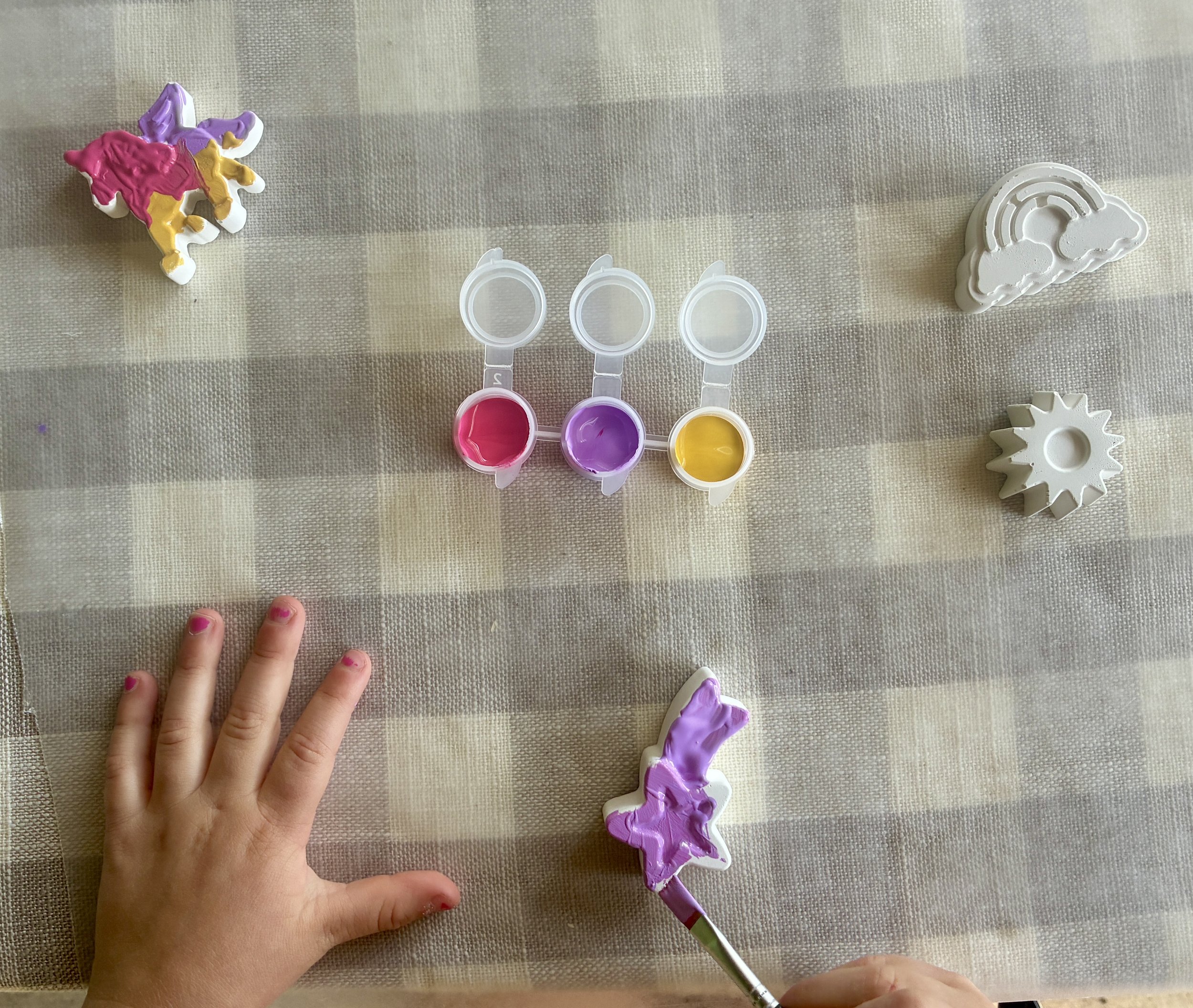 child-painting-unicorn-skies-shapes.jpg