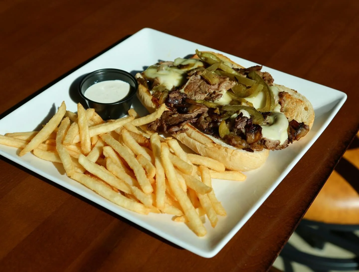 Need a meal that&rsquo;ll warm you up? Come on in and try our Philly Truffle Cheesesteak!🥩🥪

#zekesrooftopandgrill #phillytrufflecheesesteak #phillycheesesteak #johnstoniowa #johnstontowncenter