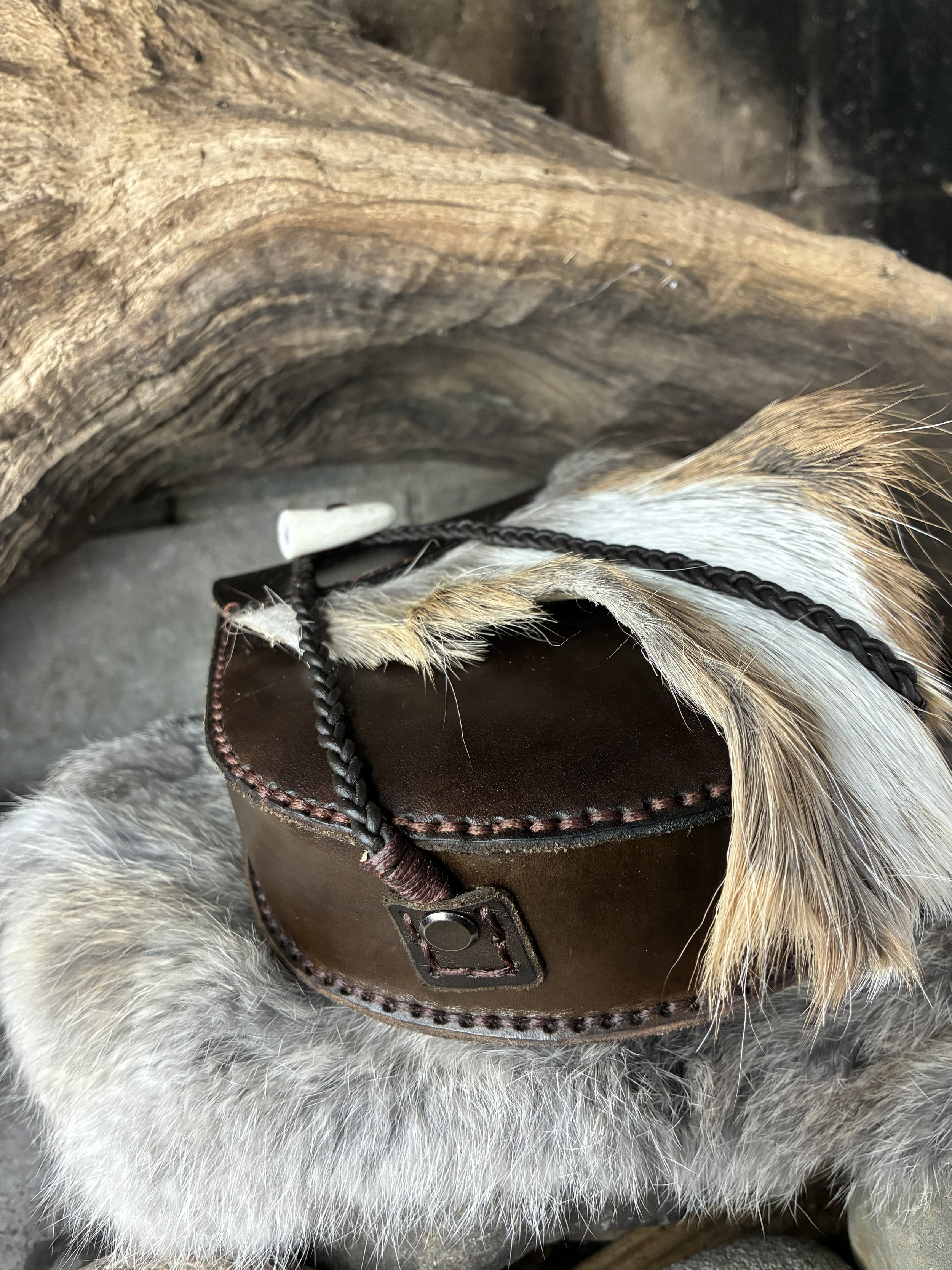 "Skinn" Exclusive Leather and Fur Belt Bag. Closure Detail