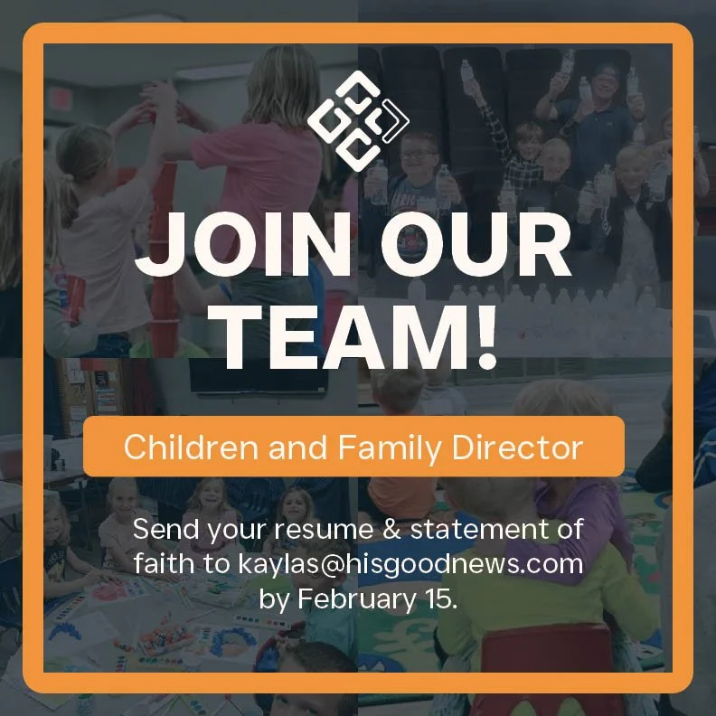 Children and adults at a birthday party or celebration, with a decorated table and balloons, in a bright indoor setting.