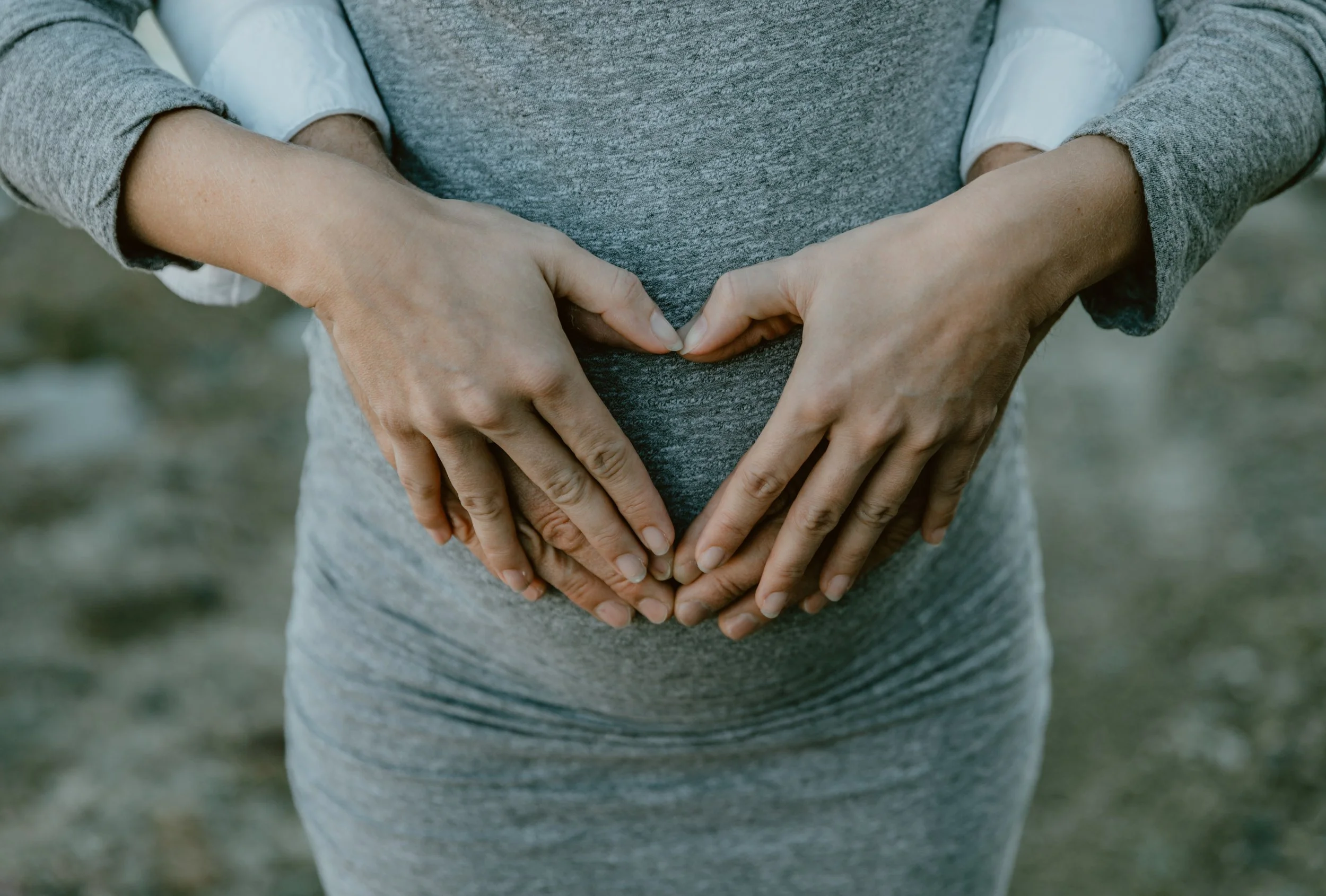 Lifestyle maternity photography highlighting movement, connection, and anticipation.