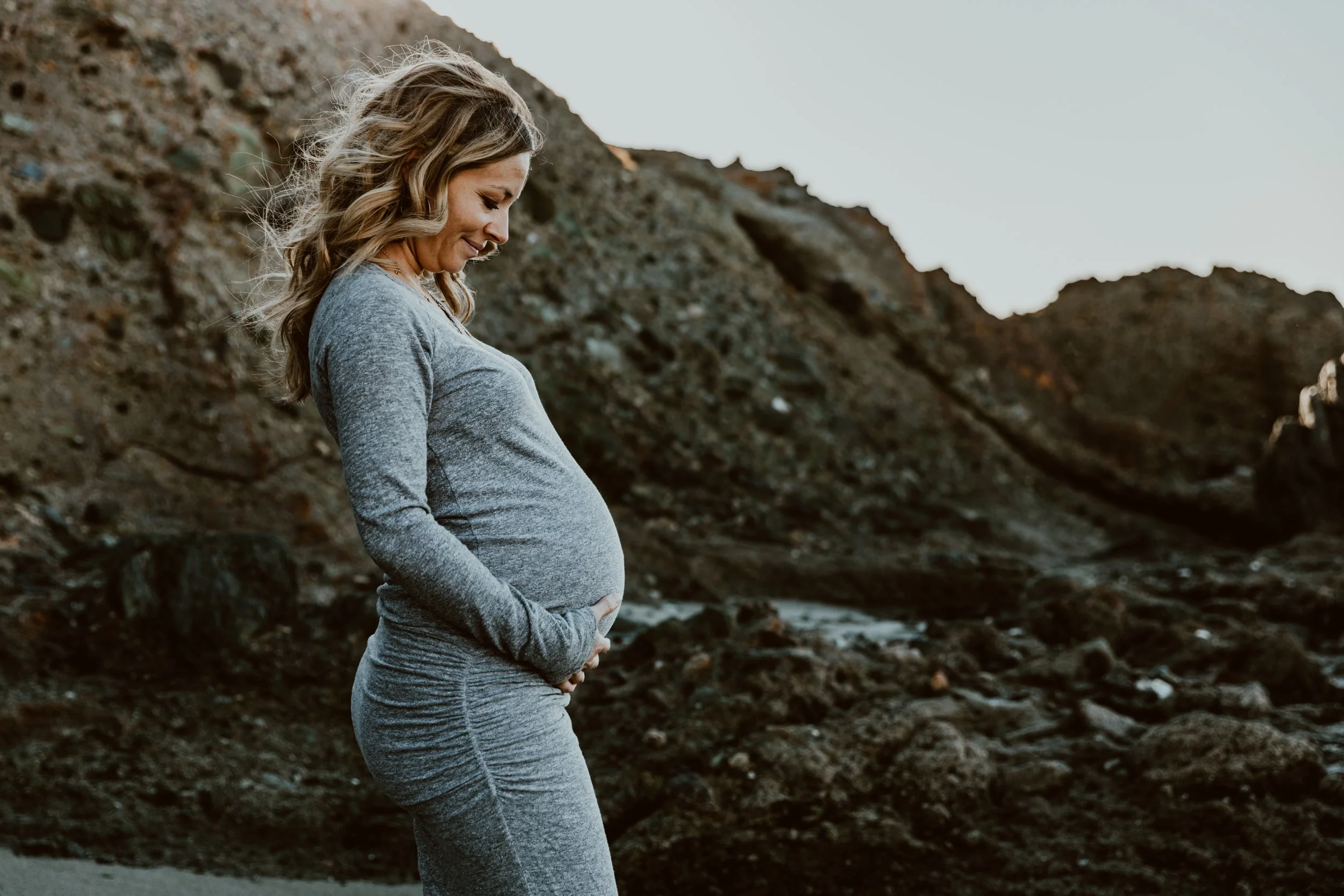 Elegant maternity session highlighting the beauty of motherhood and anticipation.