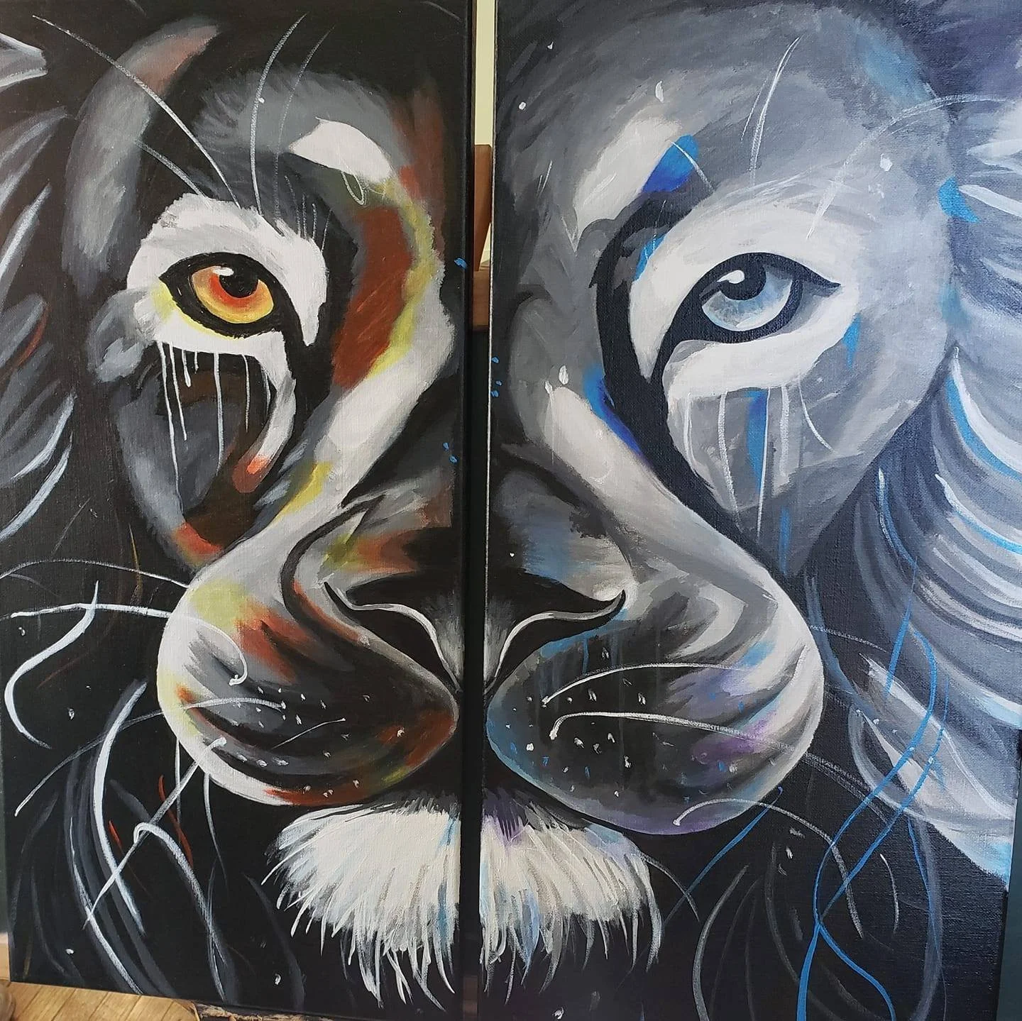 An abstract painting of a tiger's face split into two sections, with one side in warm colors and the other in cool colors, featuring expressive line work and splashes of paint.