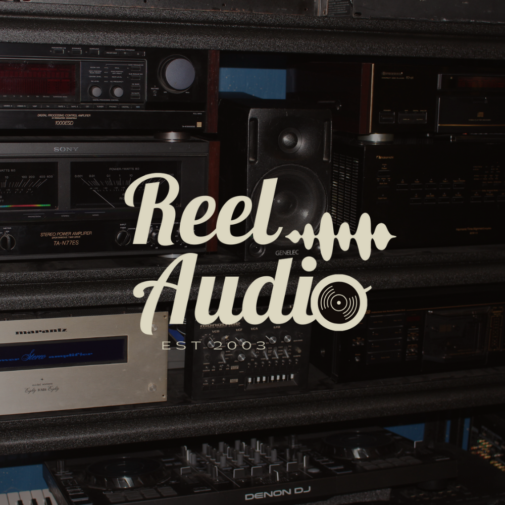 A collection of vintage audio equipment, including speakers, amplifiers, and a DJ controller, on shelves with a "Reel Audio" logo overlay.