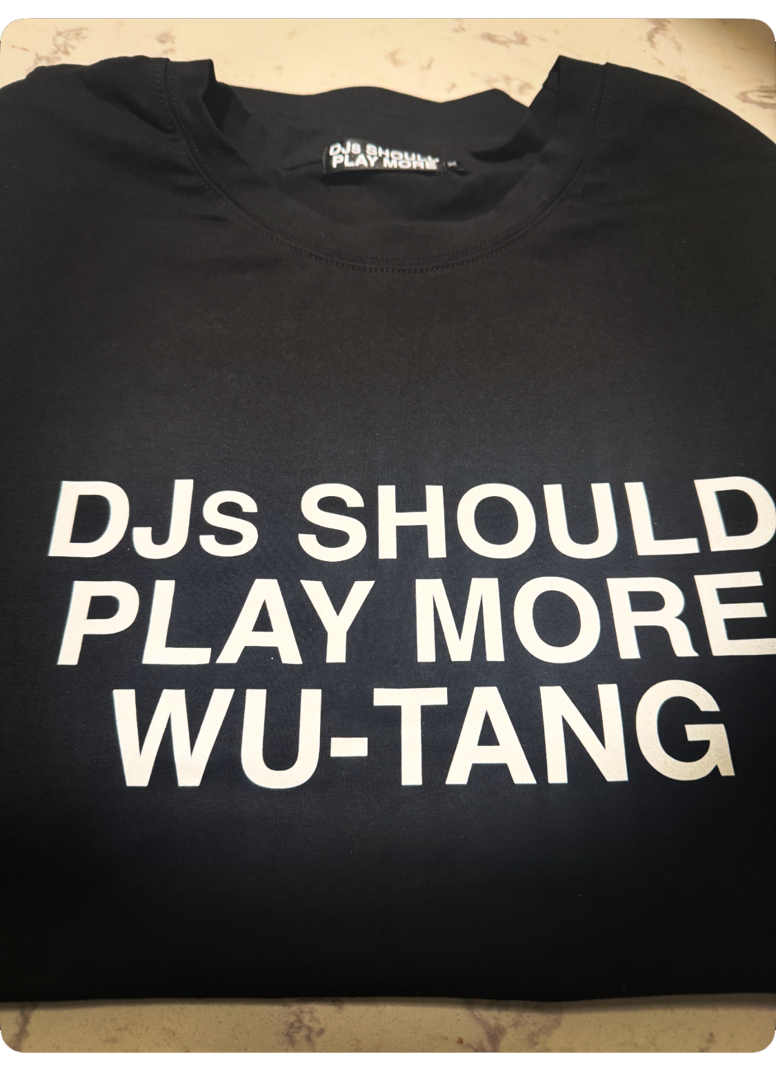 Folded DJs Should Play More Wu-inspired shirt photographed for product display