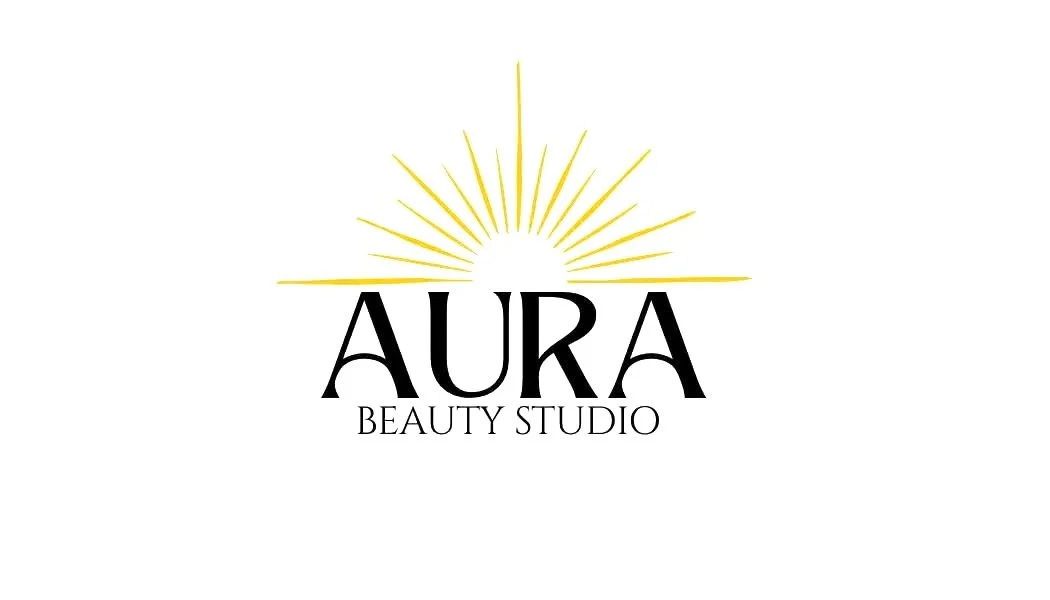 Logo for Aura Beauty Studio with a stylized sun and black text.