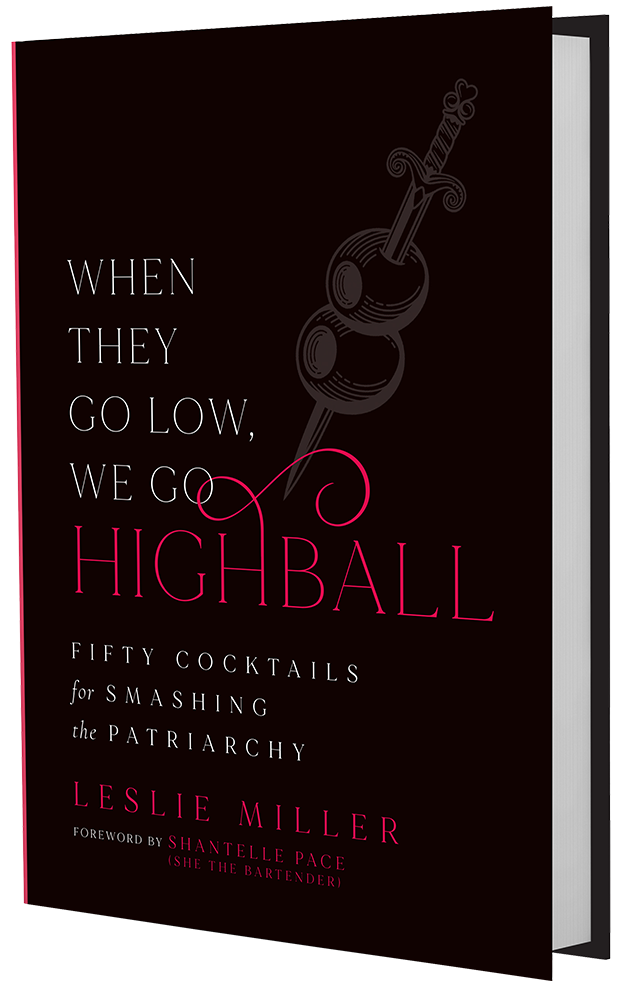 A book cover with a pink and black color scheme featuring a two skewered olives and the title "When They Go Low, We Go Highball: Fifty Cocktails for Smashing the Patriarchy".