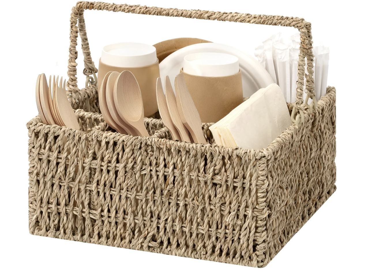Wicker basket containing disposable cups, wooden utensils, paper napkins, and white paper straws.