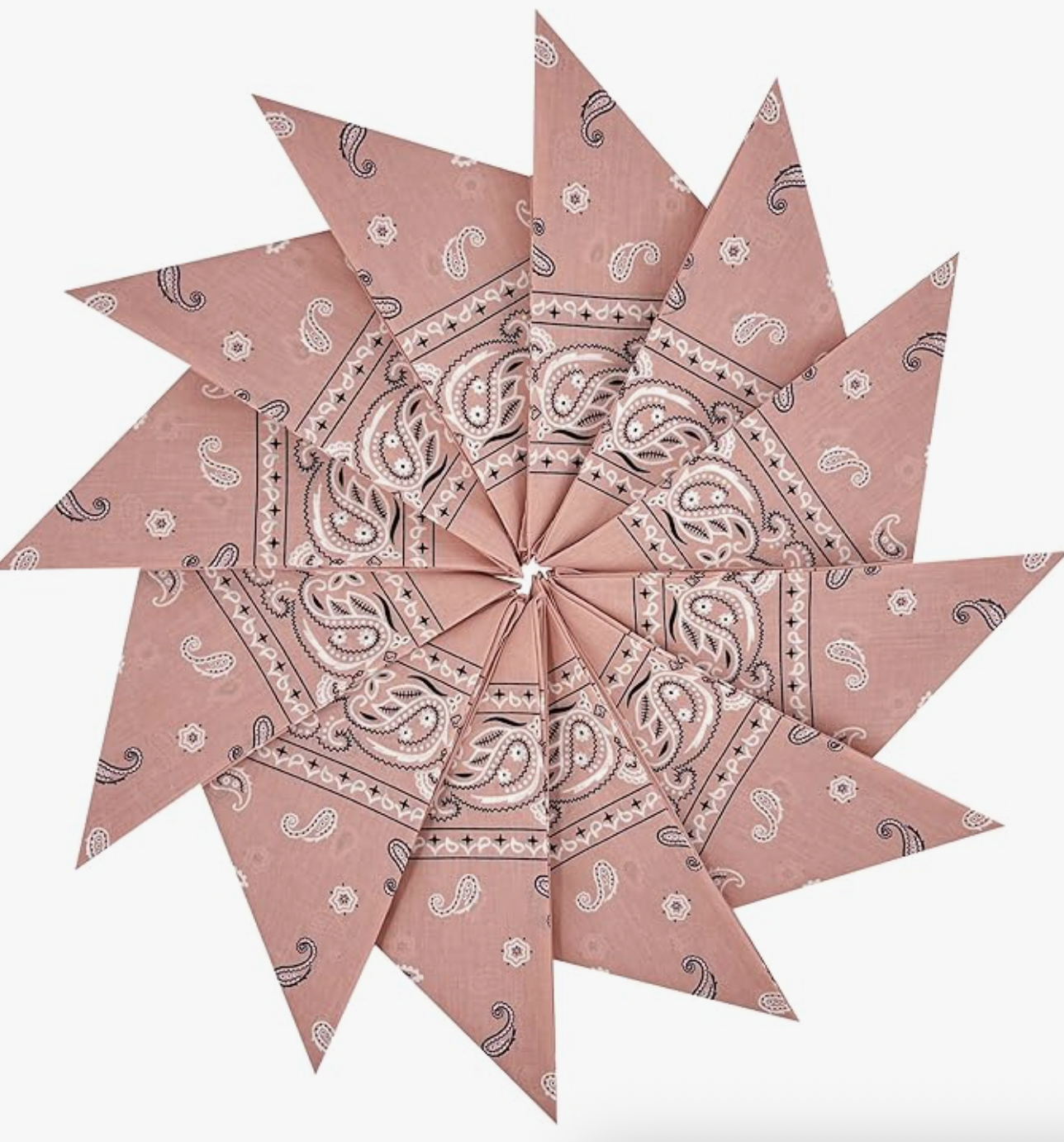 Pink bandana with paisley pattern folded into a star shape.