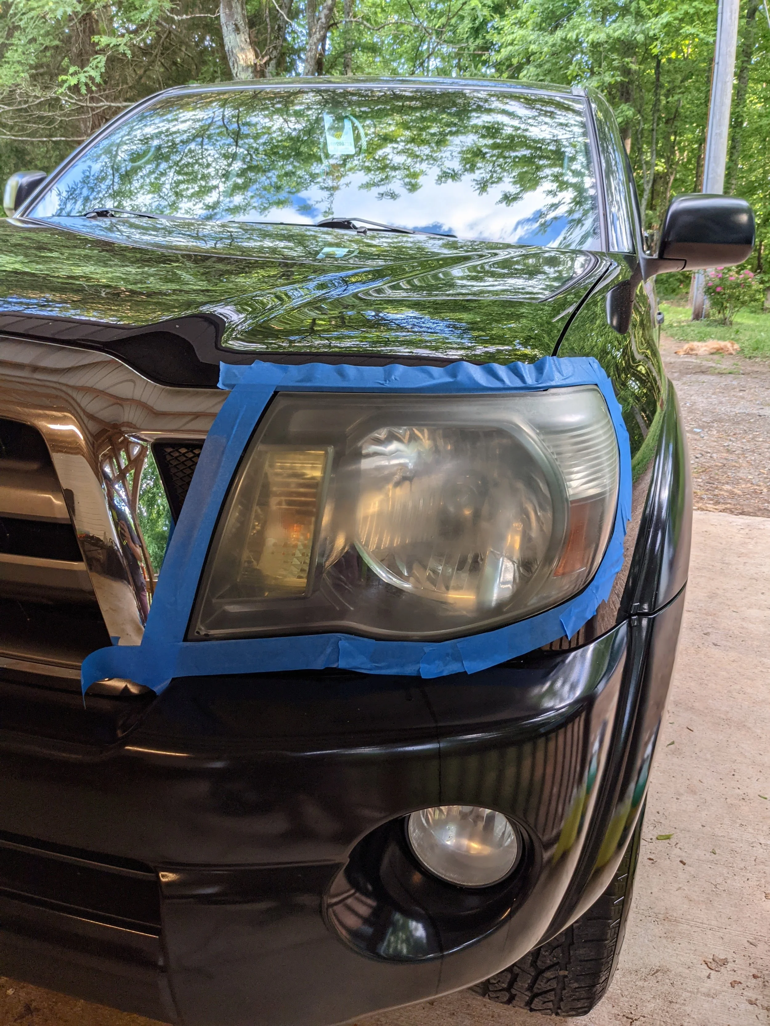 Before of headlight restoration on Toyota Tacoma