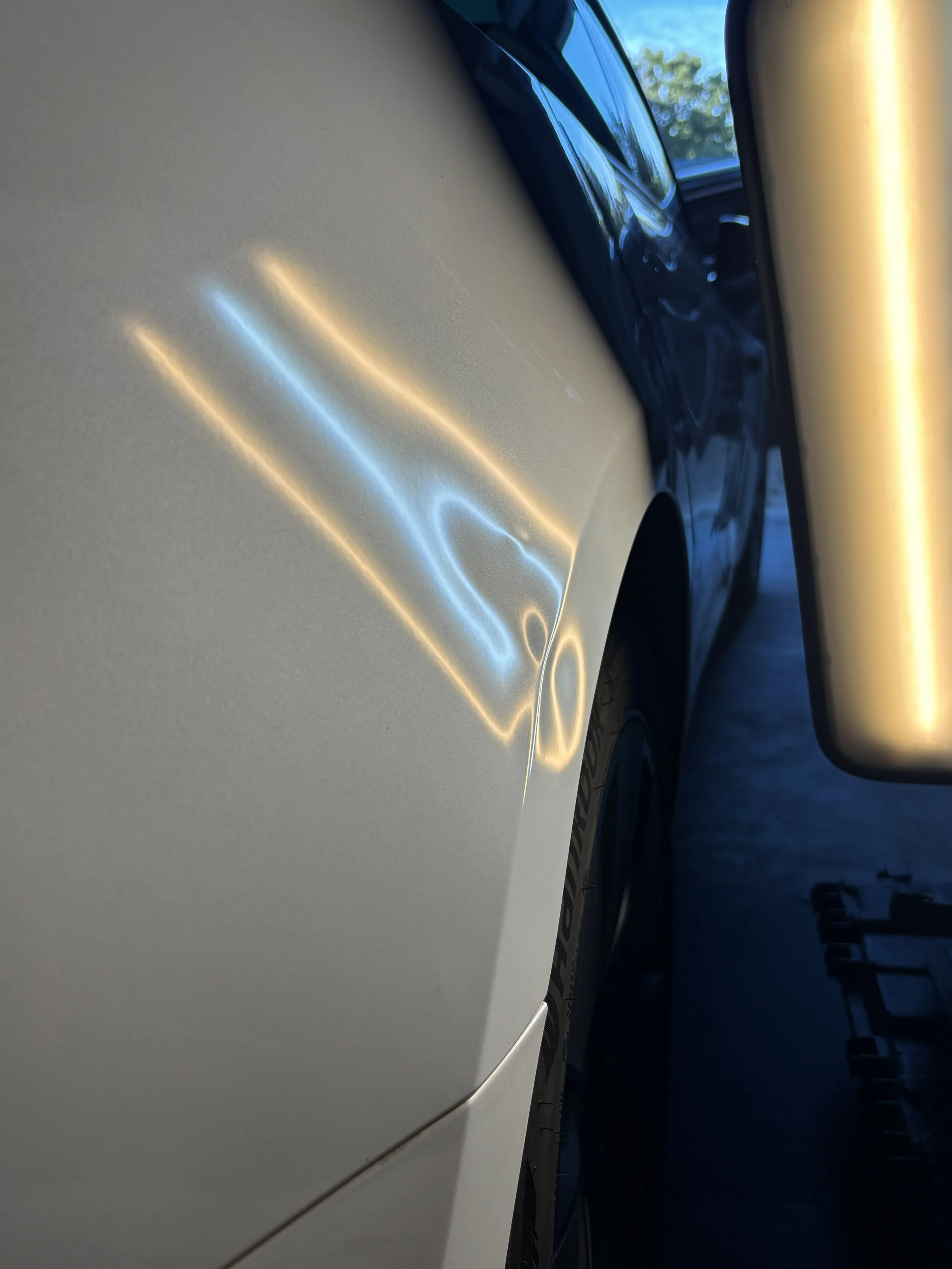 Before of PDR on Tesla right quarter panel