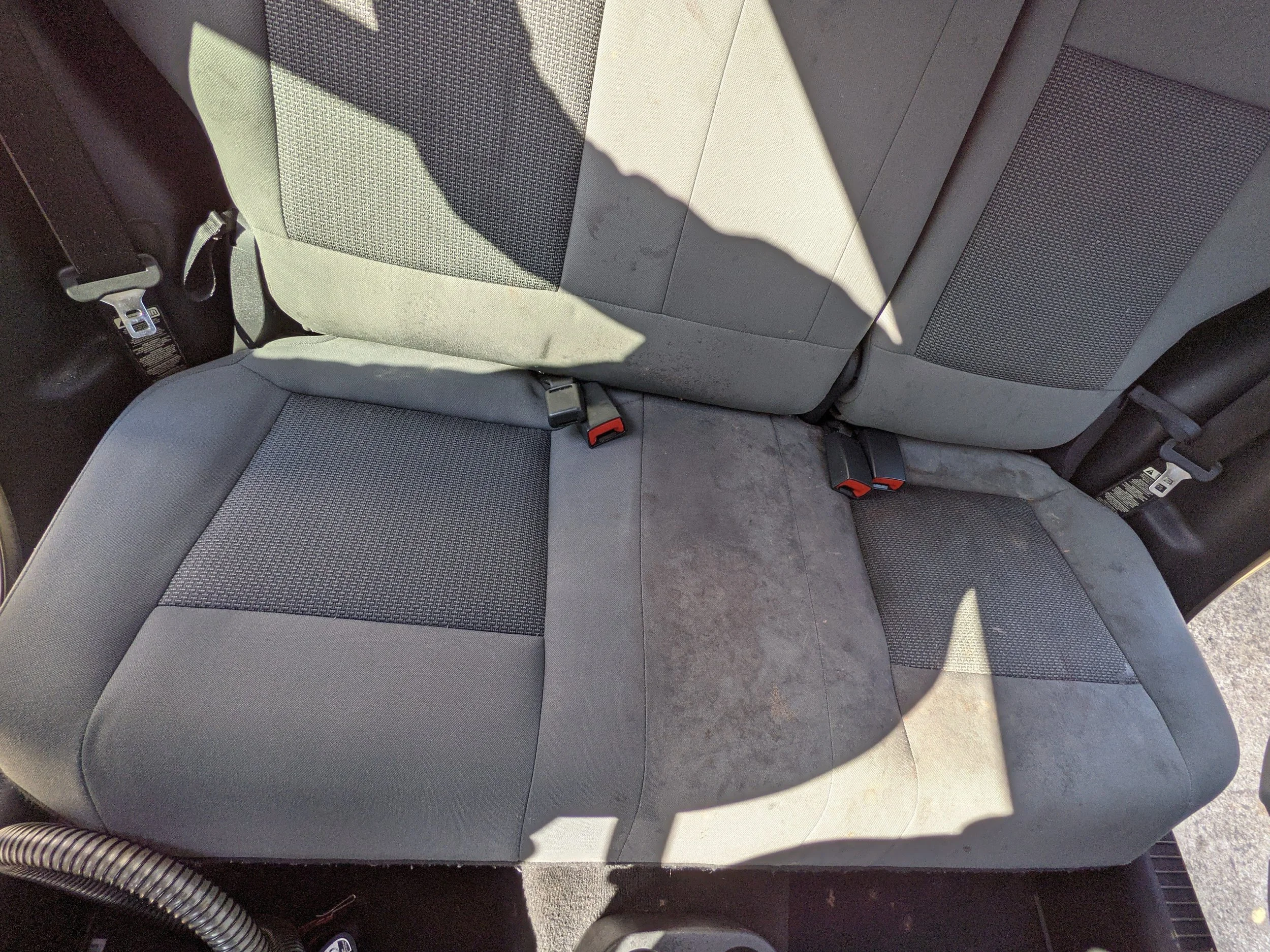 Before and After of dirty seat in Jeep Compass