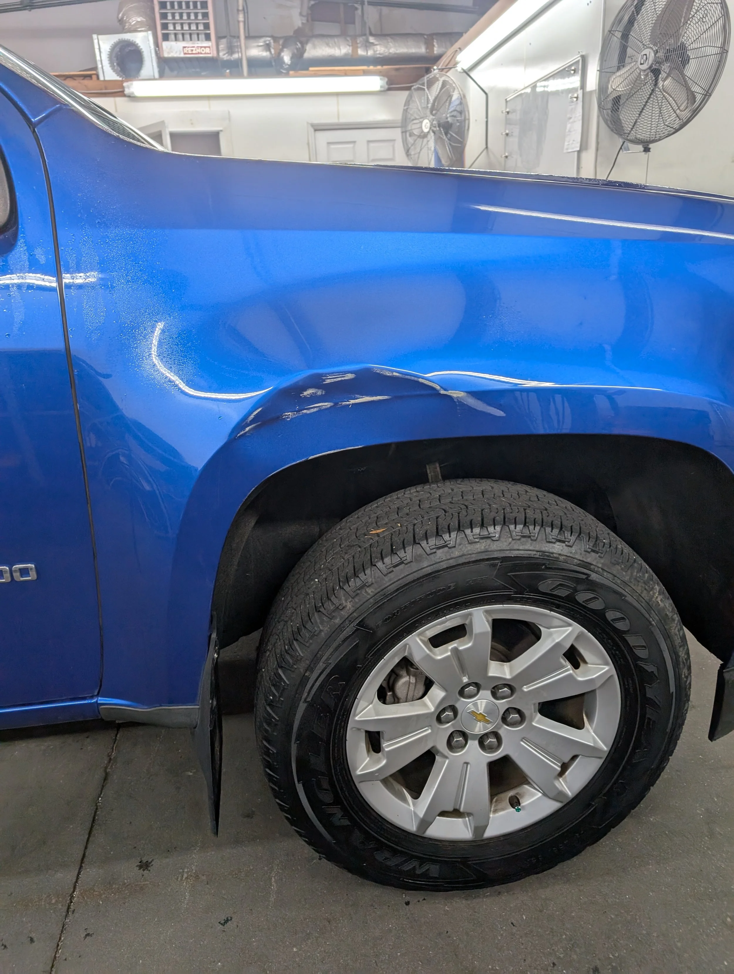 Before of PDR on Chevy Colorado right fender 
