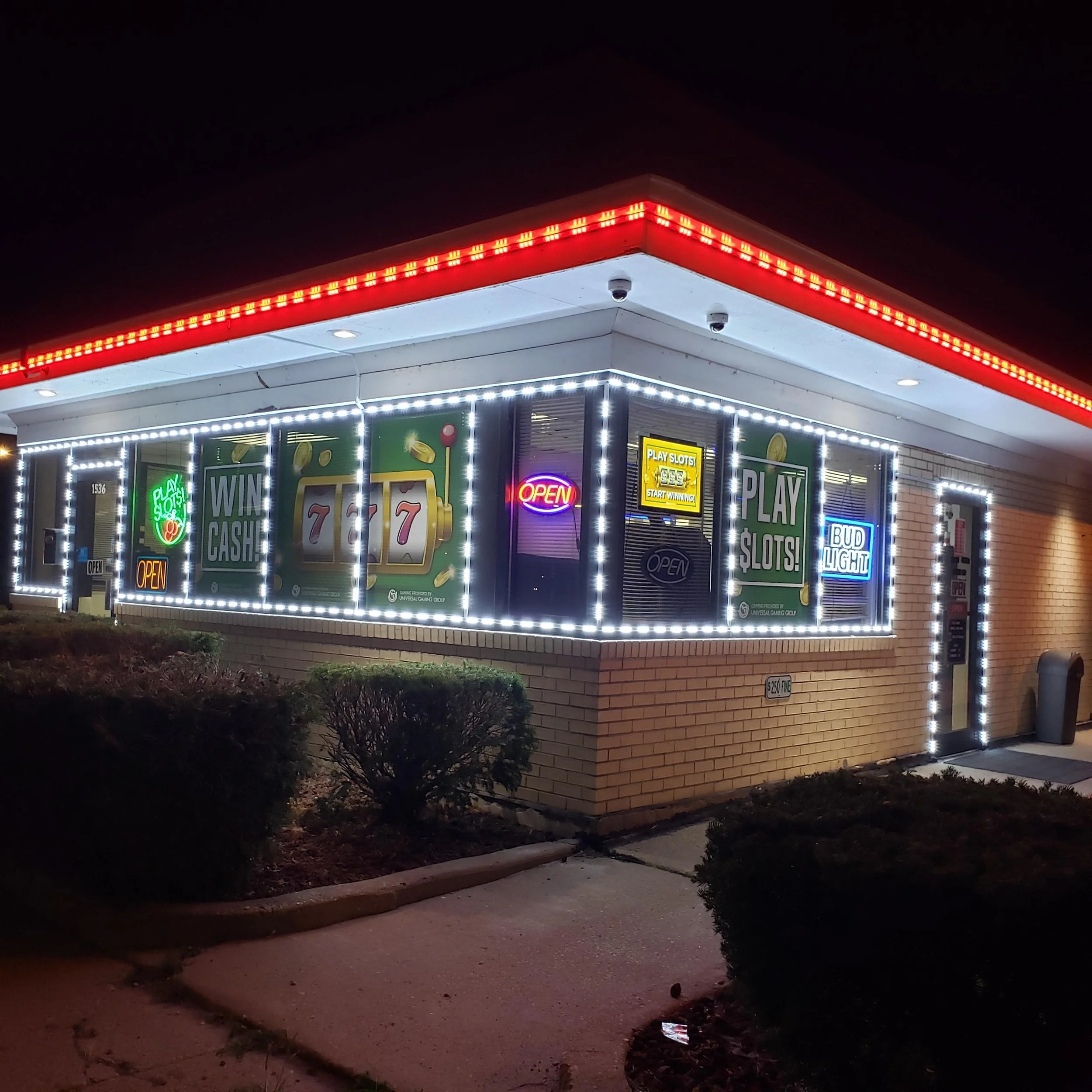 Nighttime exterior view of our establishment, to help you know that you arrived at Lucky Bo Gaming.