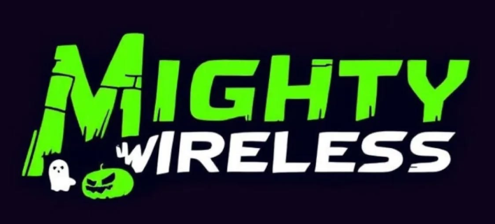 Logo for Mighty Wireless with green and white text, cartoon ghost and pumpkin on a black background.