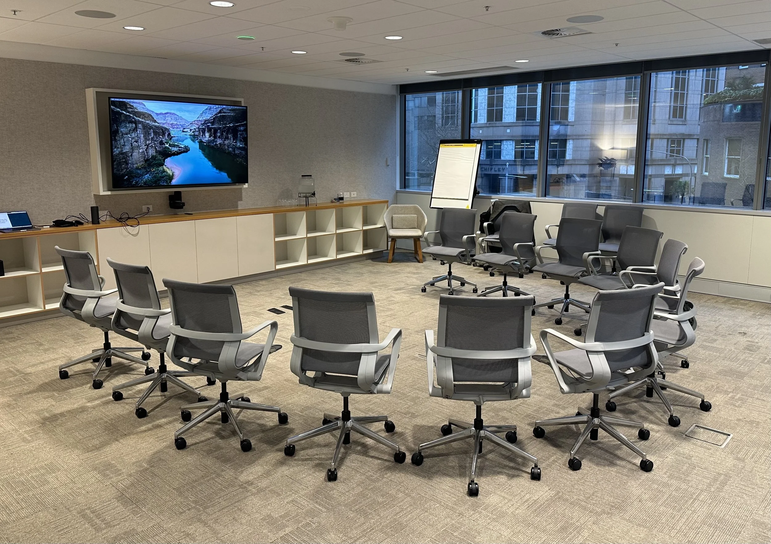 Meeting room set up with chairs in a circle for a leadership workshop