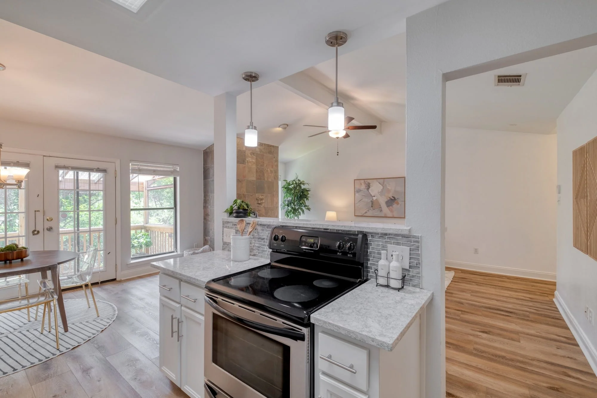 Remodeled North Loop Austin kitchen and dining area with deck access