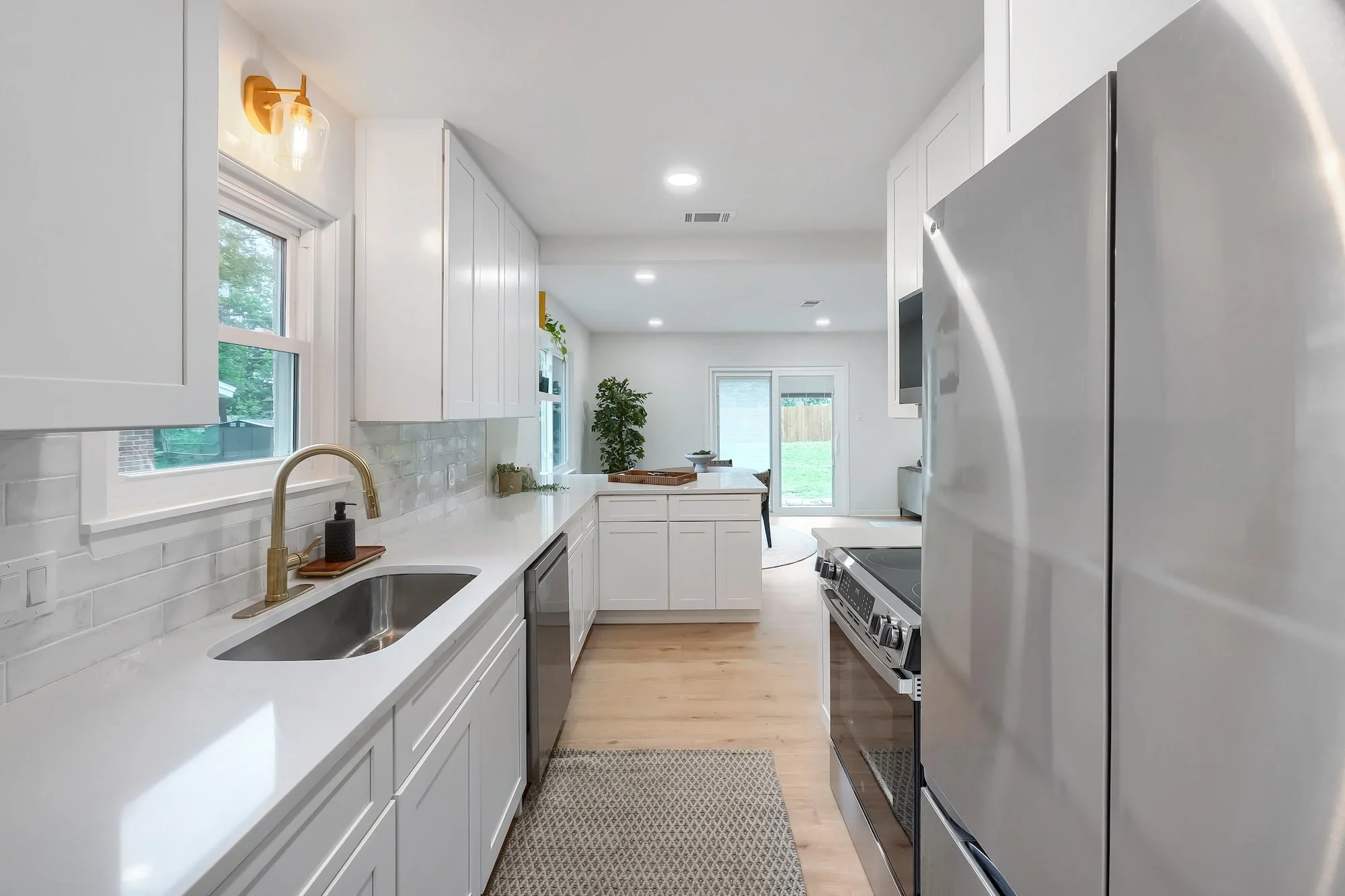 Functional galley layout with abundant cabinetry and prep space