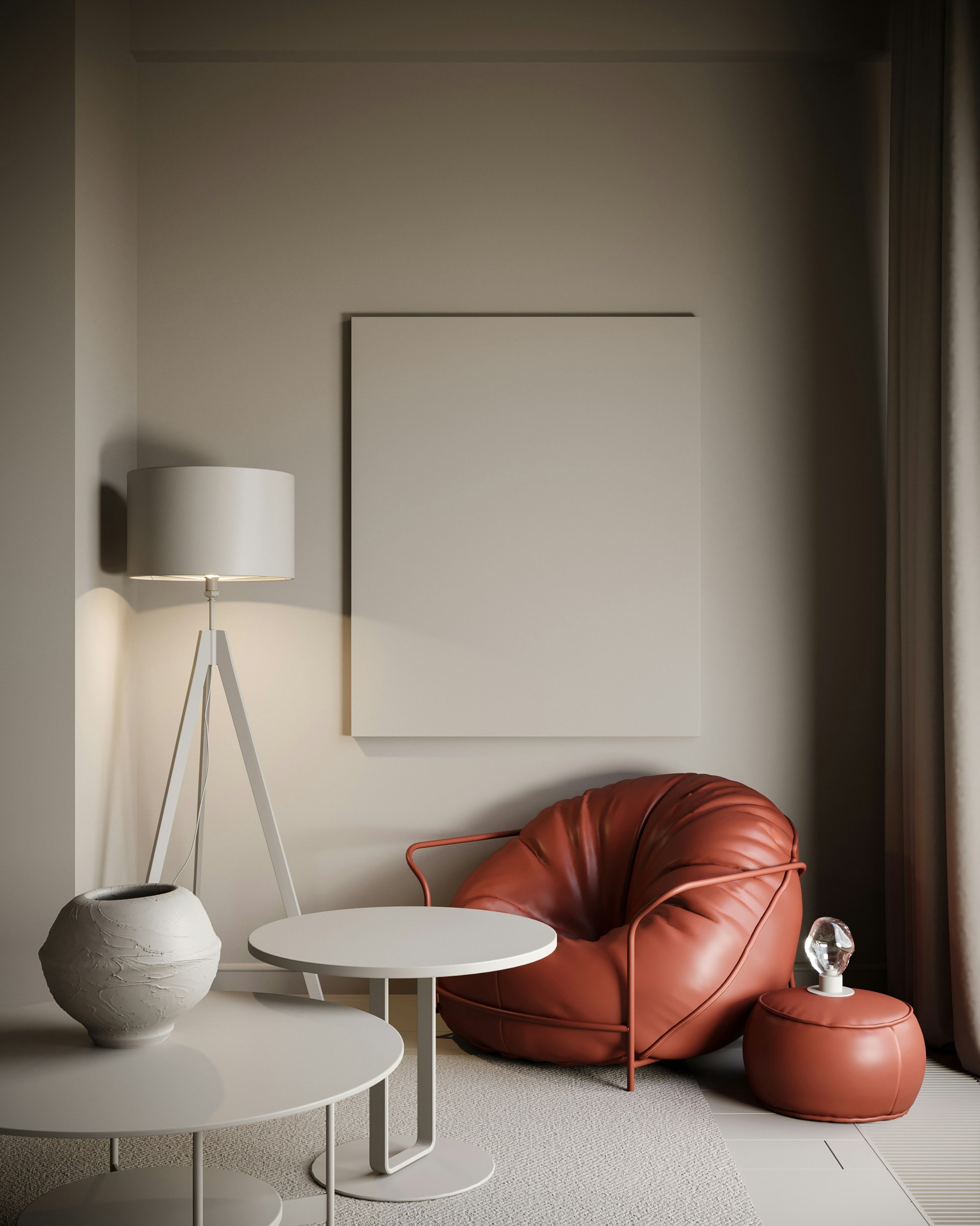 Minimalist sitting nook with terracotta leather chair, white floor lamp, and side tables