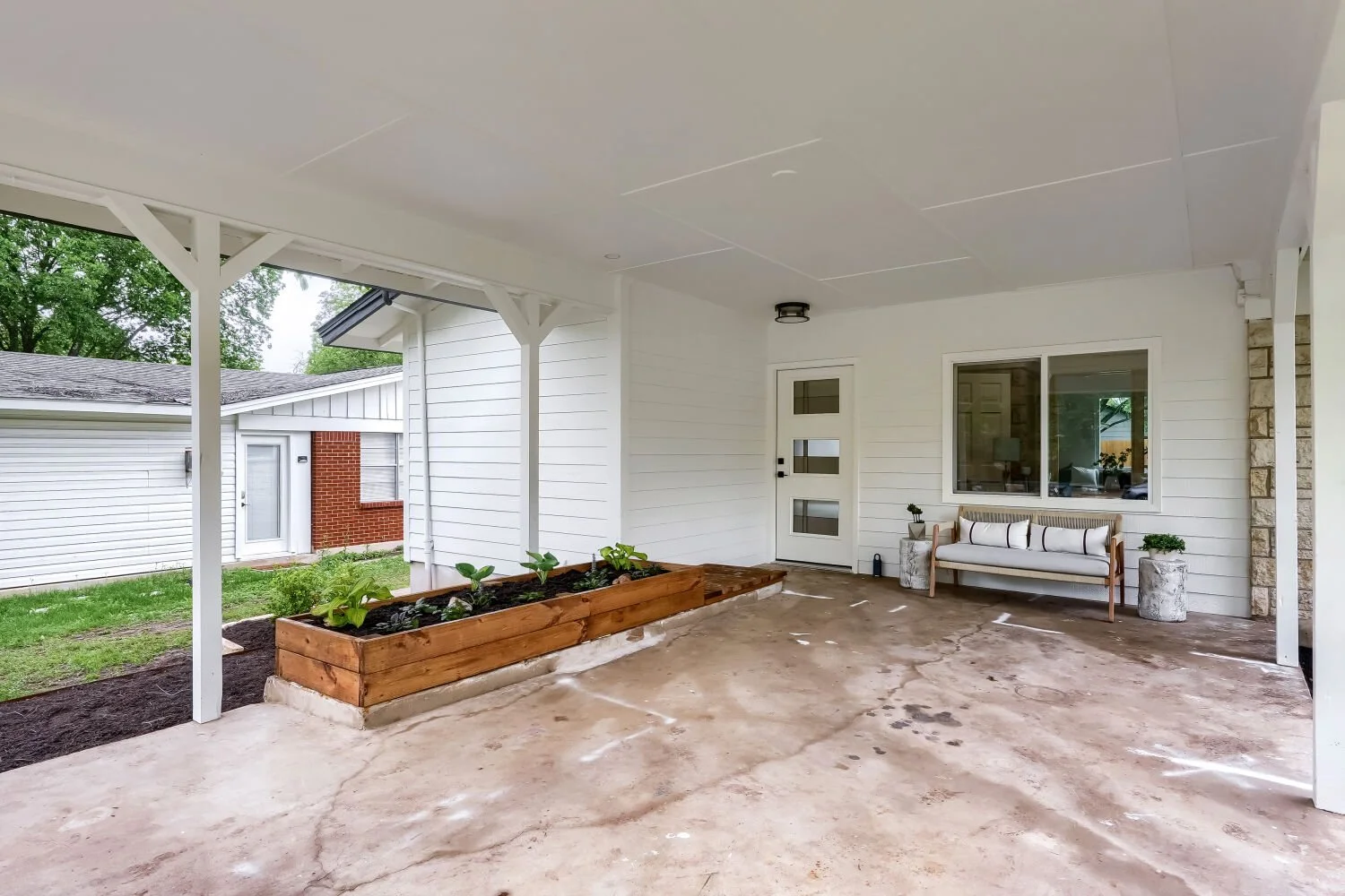 Welcoming covered front porch with room to relax and entertain