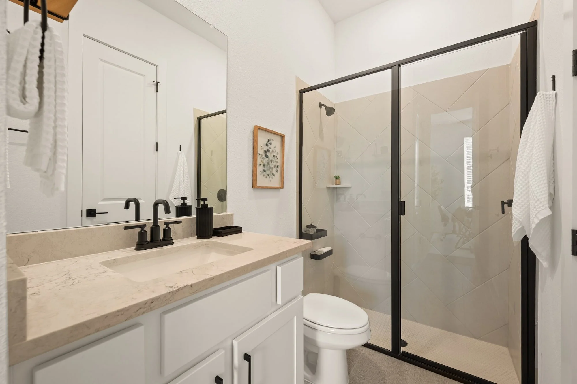 Modern full bathroom featuring designer finishes and a spacious walk-in shower