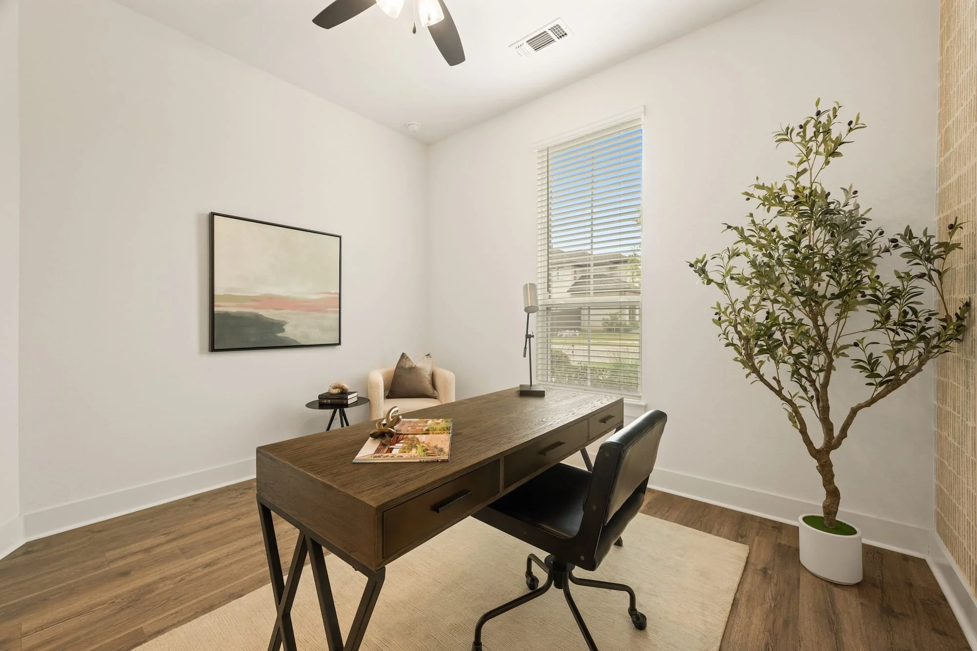 Dedicated home office with natural light, modern finishes, and flexible work-from-home space