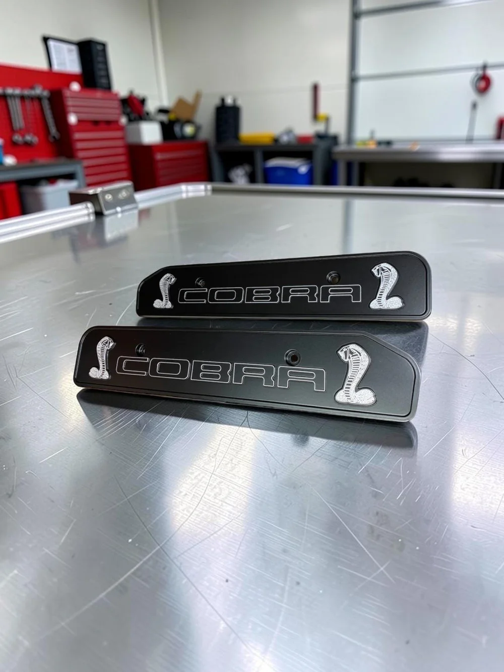 Cobra engraved billet coil covers