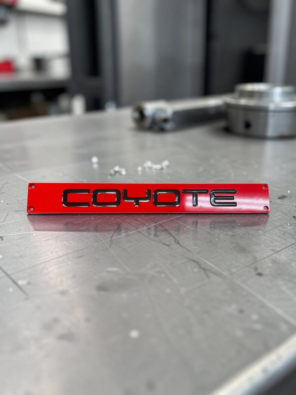 Billet Coyote radiator plate, red powder coat