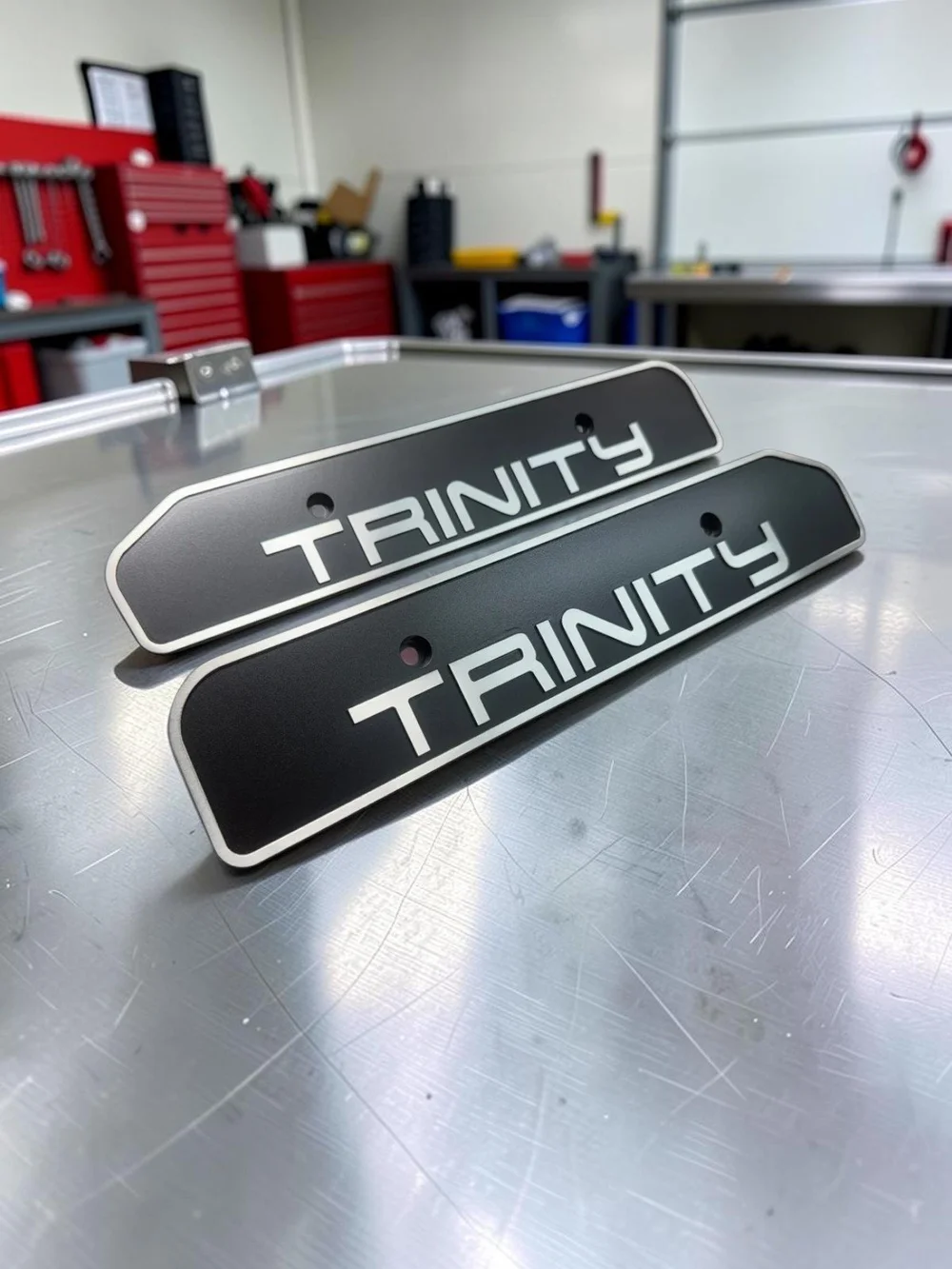 Trinity engraved billet coil covers