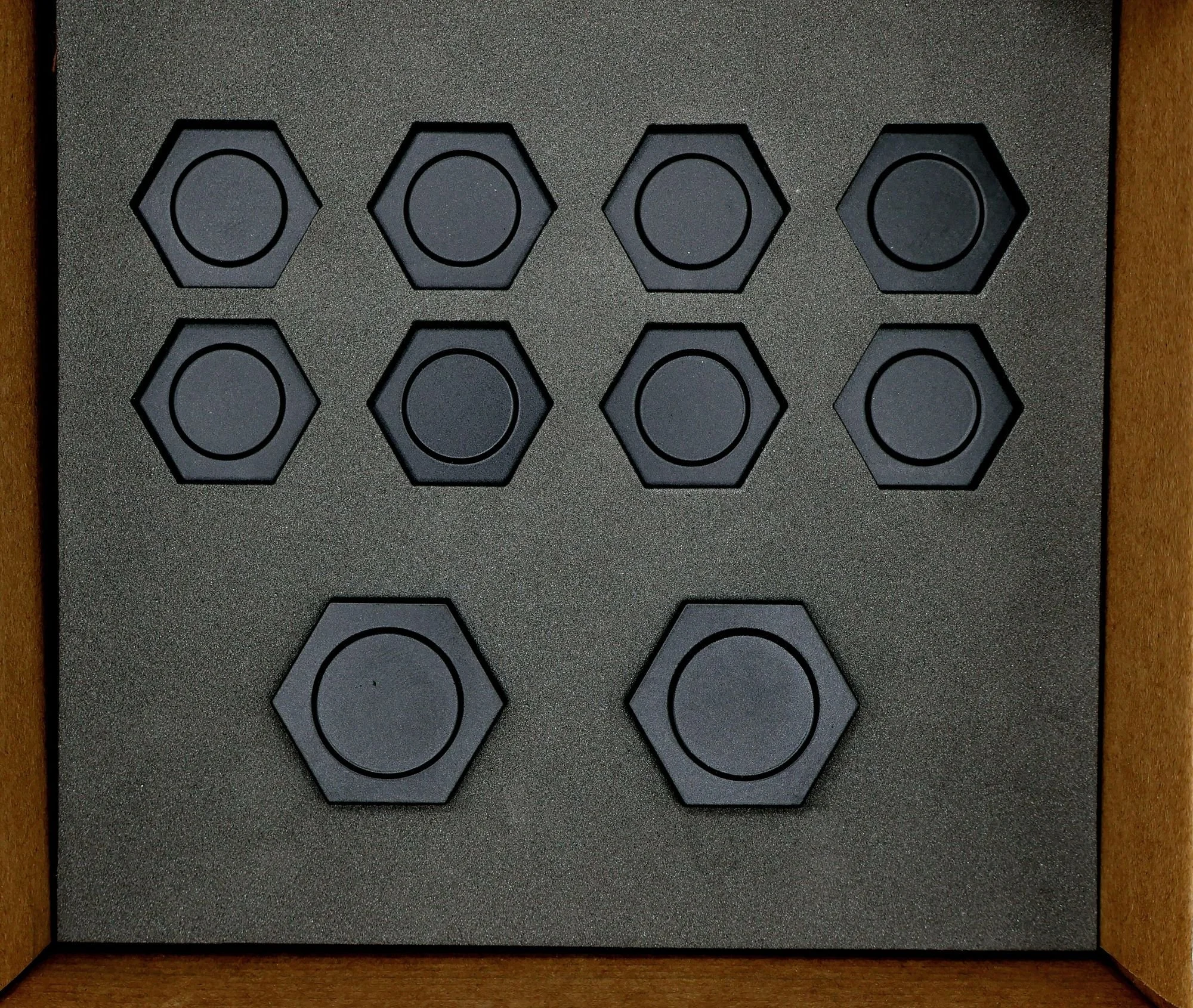 Complete ten-piece billet shock tower cap set packaged in foam
