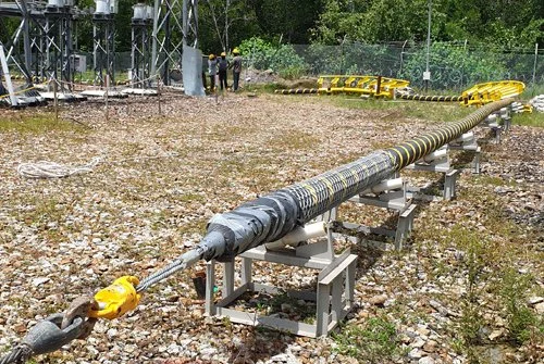 Submarine cable pulled ashore.