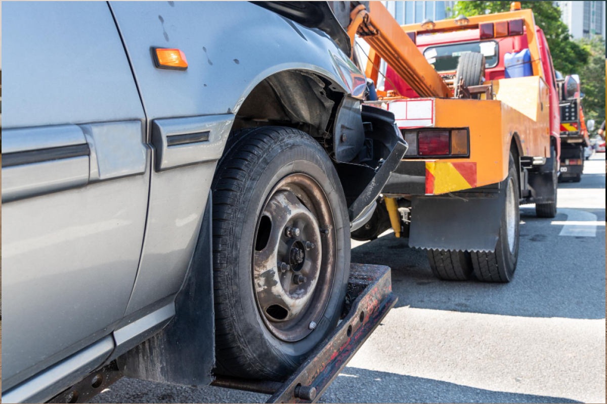 Can a Tow Truck Help Move a Car With a Damaged Wheel?