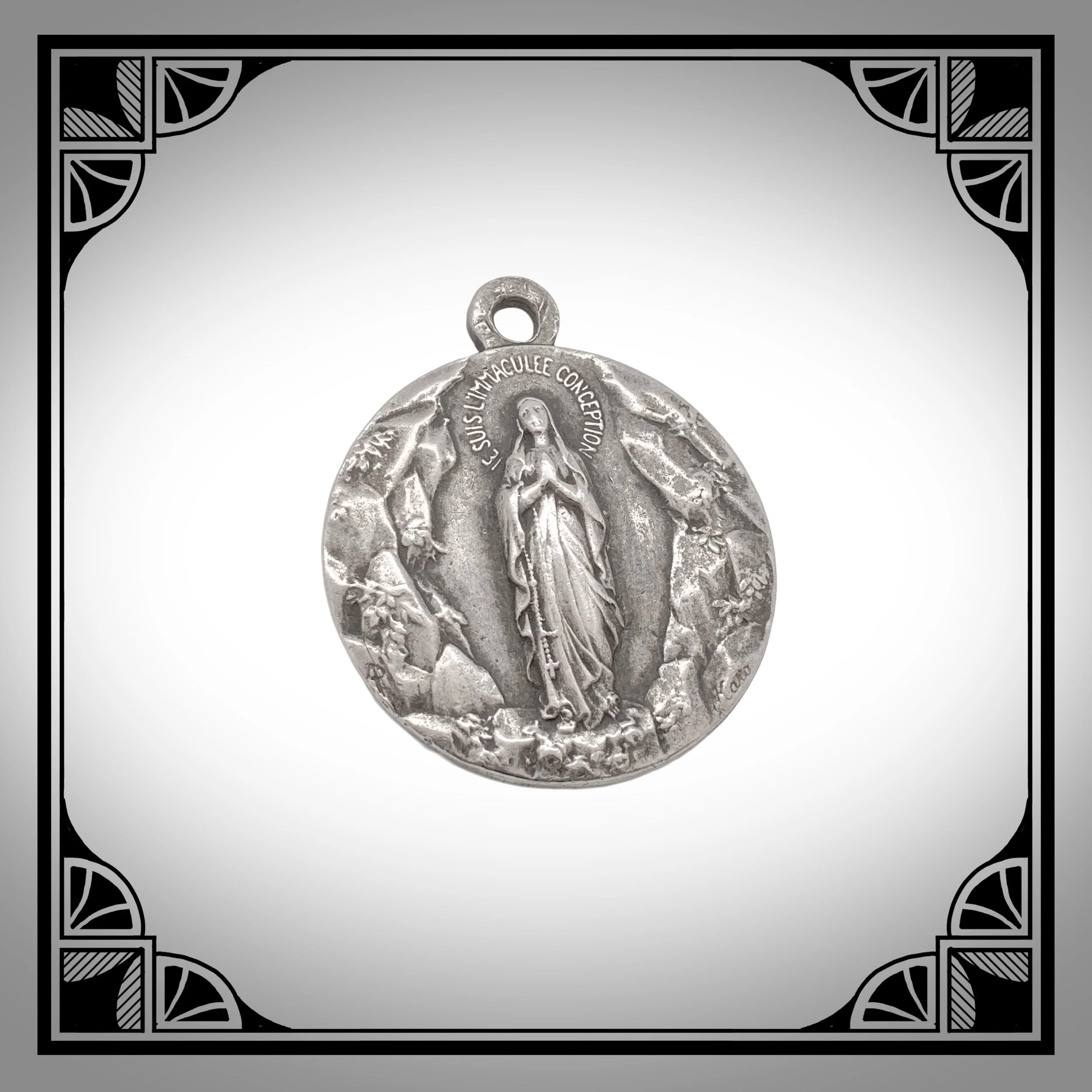 1900s Silver Religious pendant depicting our lady of Lourdes.jpg