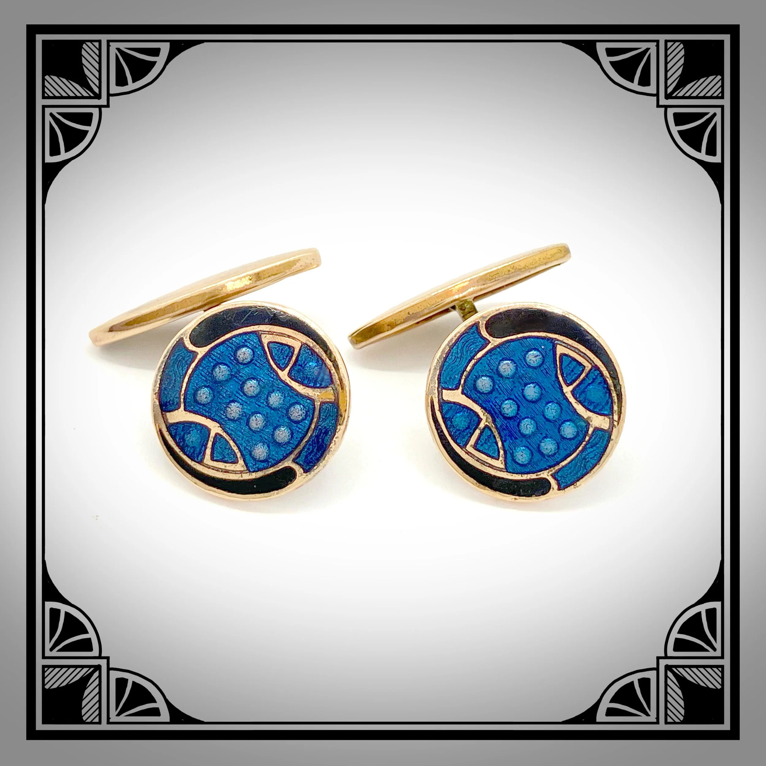 1920s Art-Deco cufflinks with blue and black enamel champlevé and guilloché centerpiece with raised details.jpg
