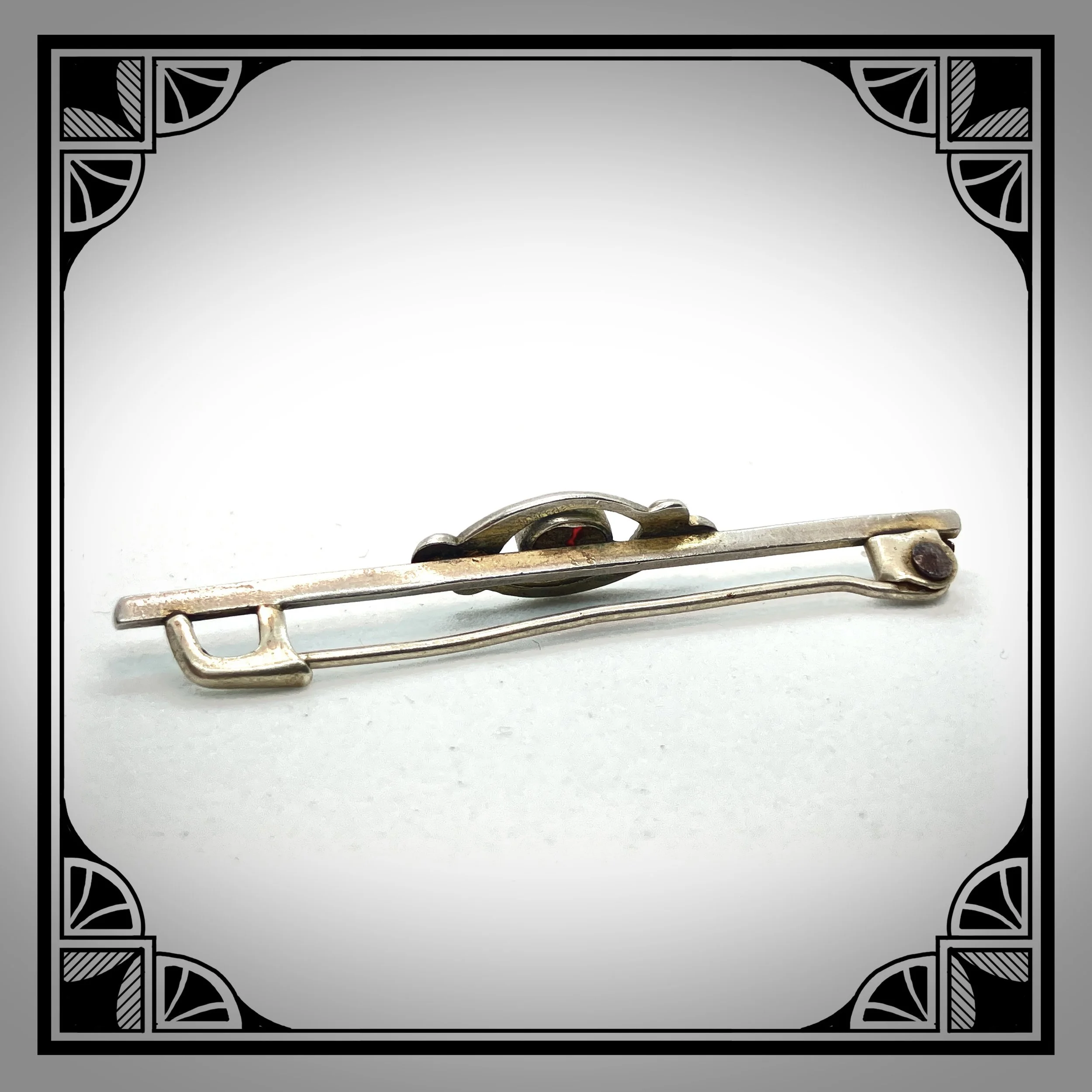 1920s silver colored bar pin with red gemstone 3.jpg