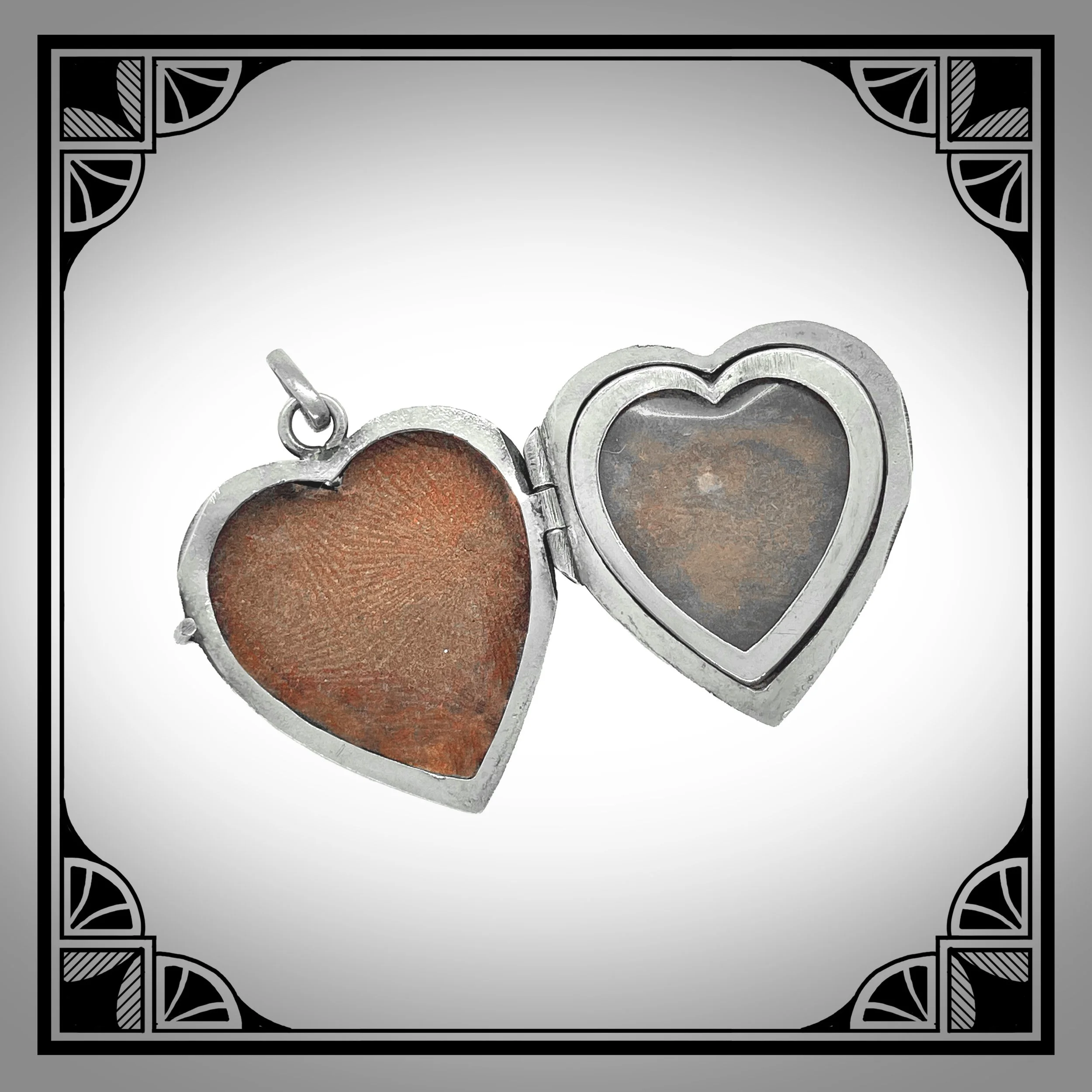 c1910 Silver Art-Nouveau Heart Locket with Pine Branches in raised relief 3.jpg