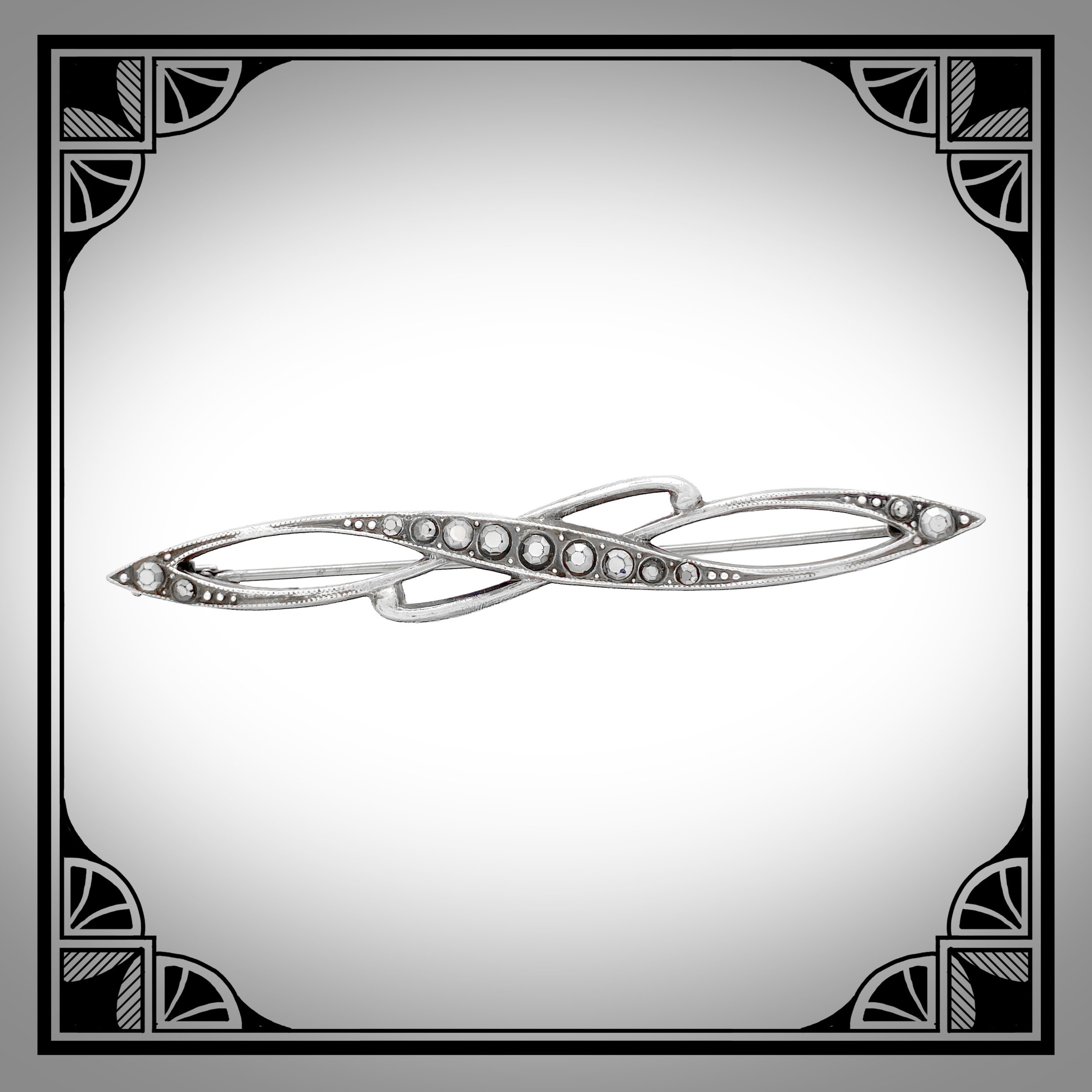 1920s Cast Openwork brooch set with marcasites