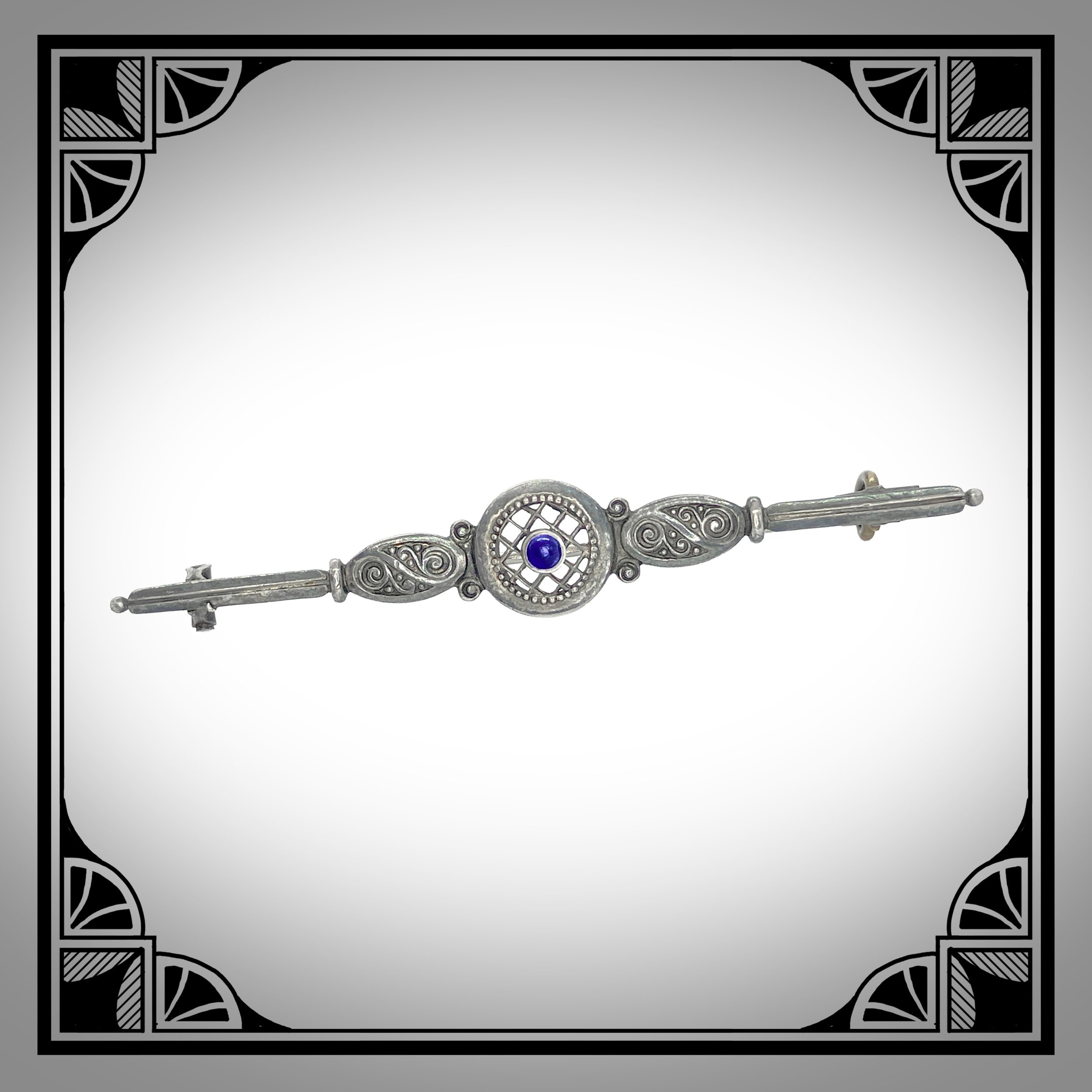 c1910 German Blued Silver Openwork Bar Brooch with Blue Cabochon by Andreas Odenwald.jpg