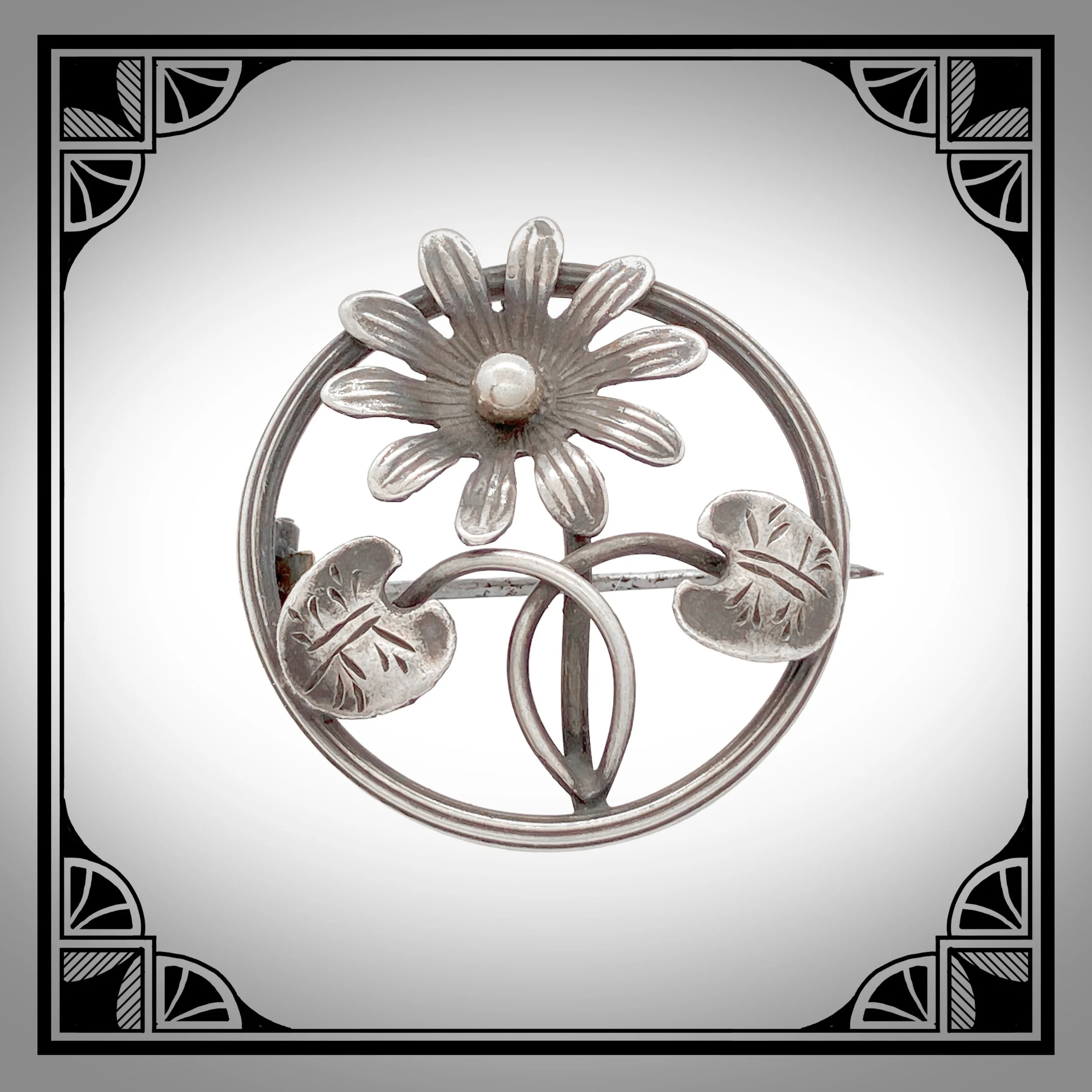 1910s French Silver Art-Nouveau brooch with stylised flower