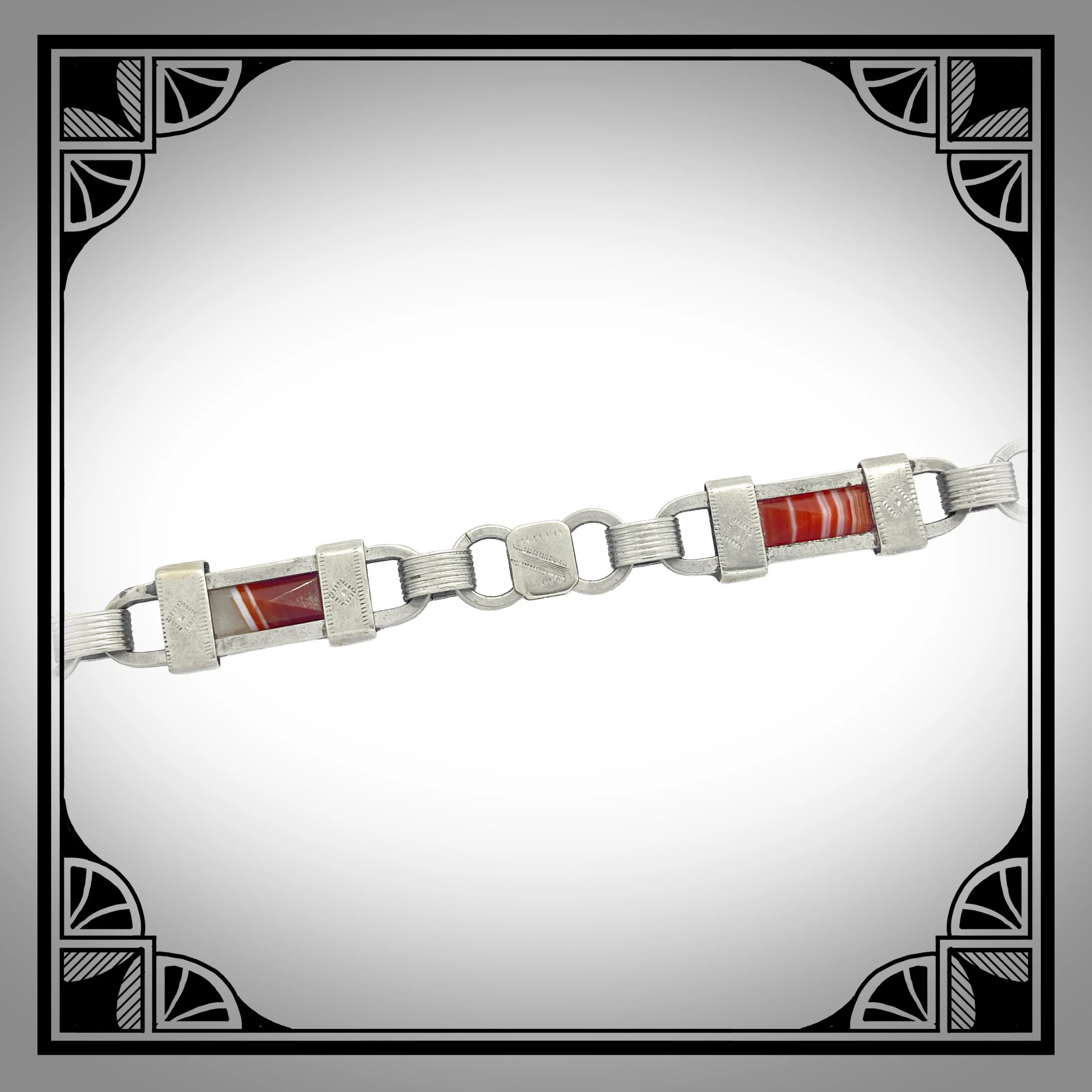 1880s German Historicist Watch Chain with chased accents, set with red Agate stones 3.jpg