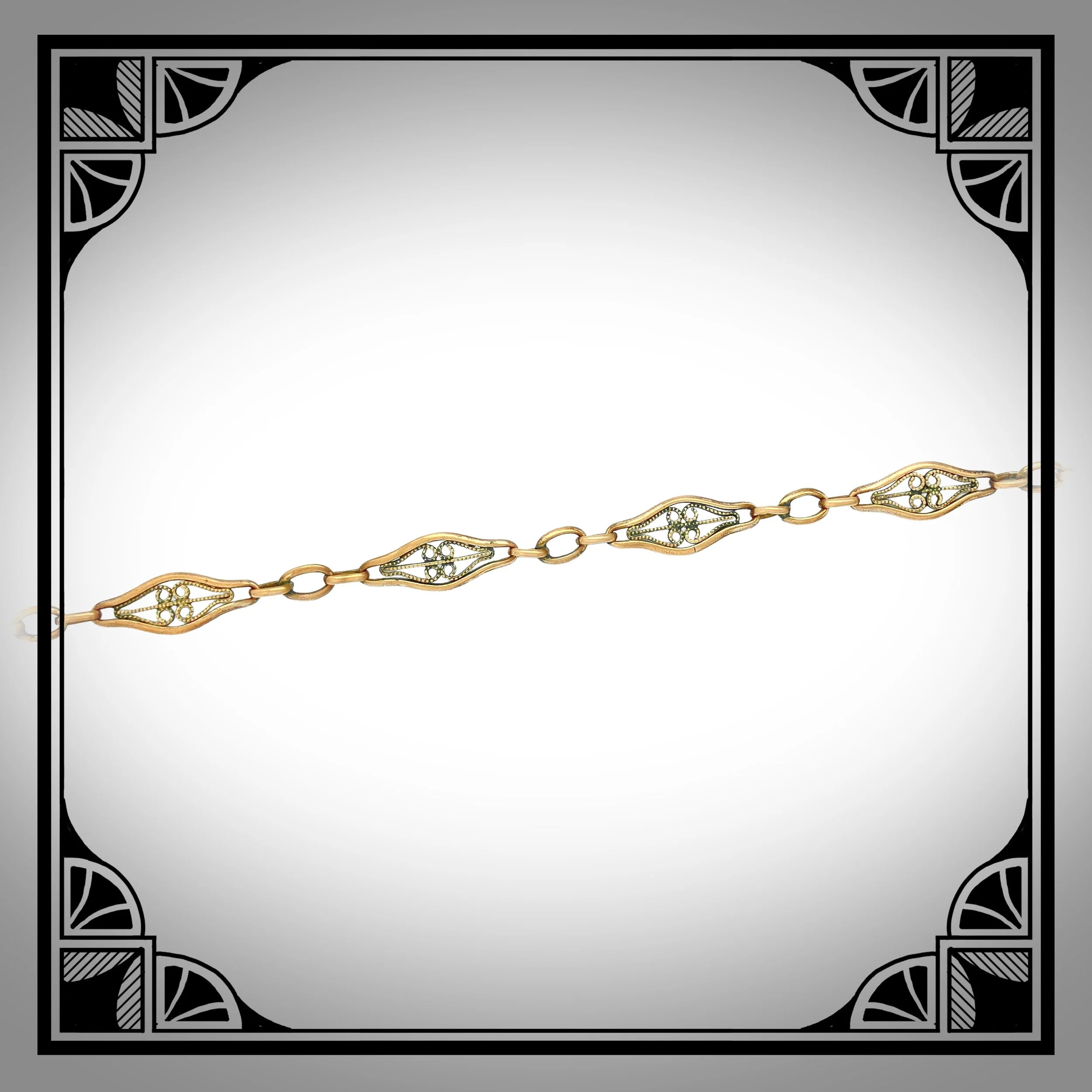 1910s Gold-Plated openwork filigree waldemar watch chain 2.jpg