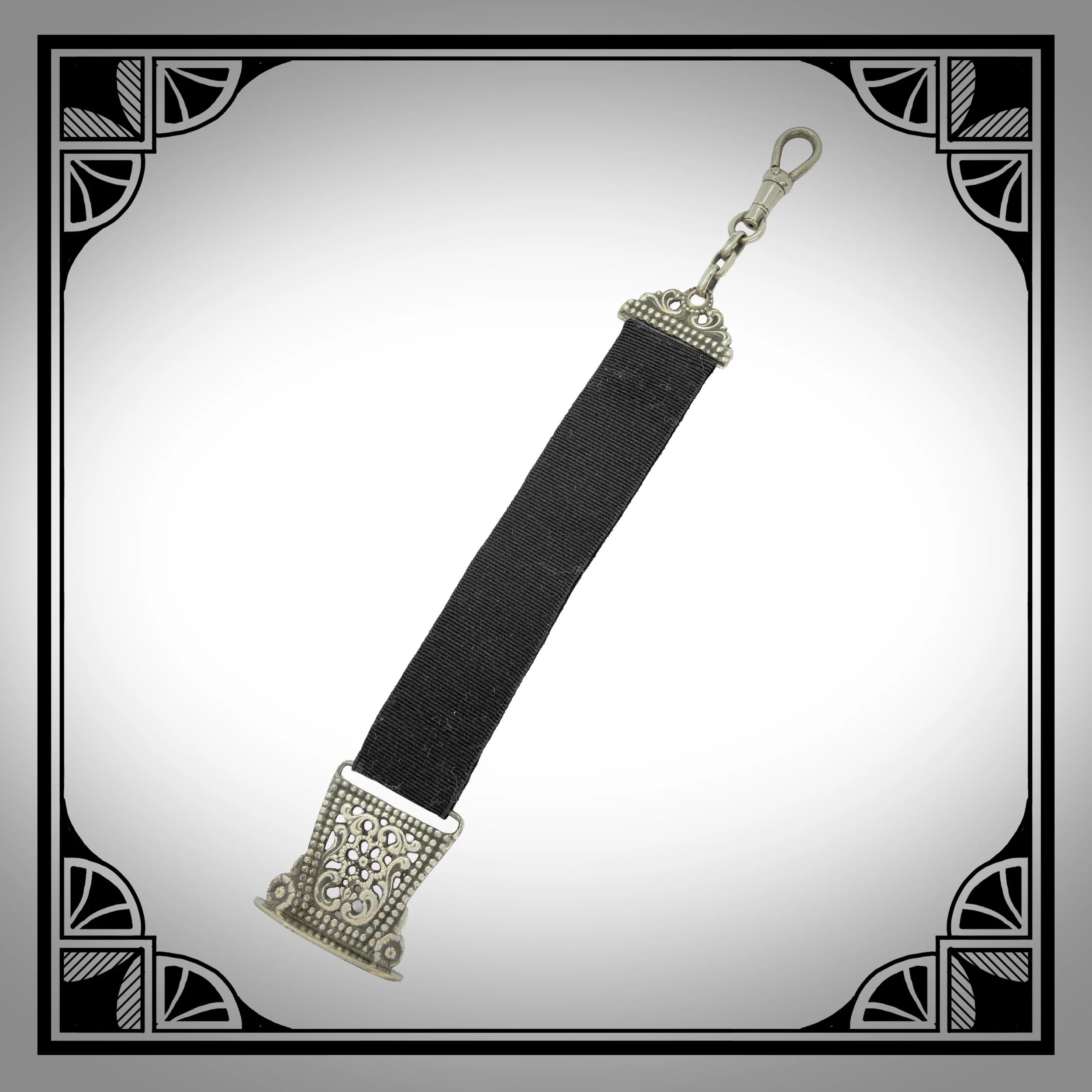 1920s Silver Openwork Ribbon Watch Fob with engraved initials “AHK”